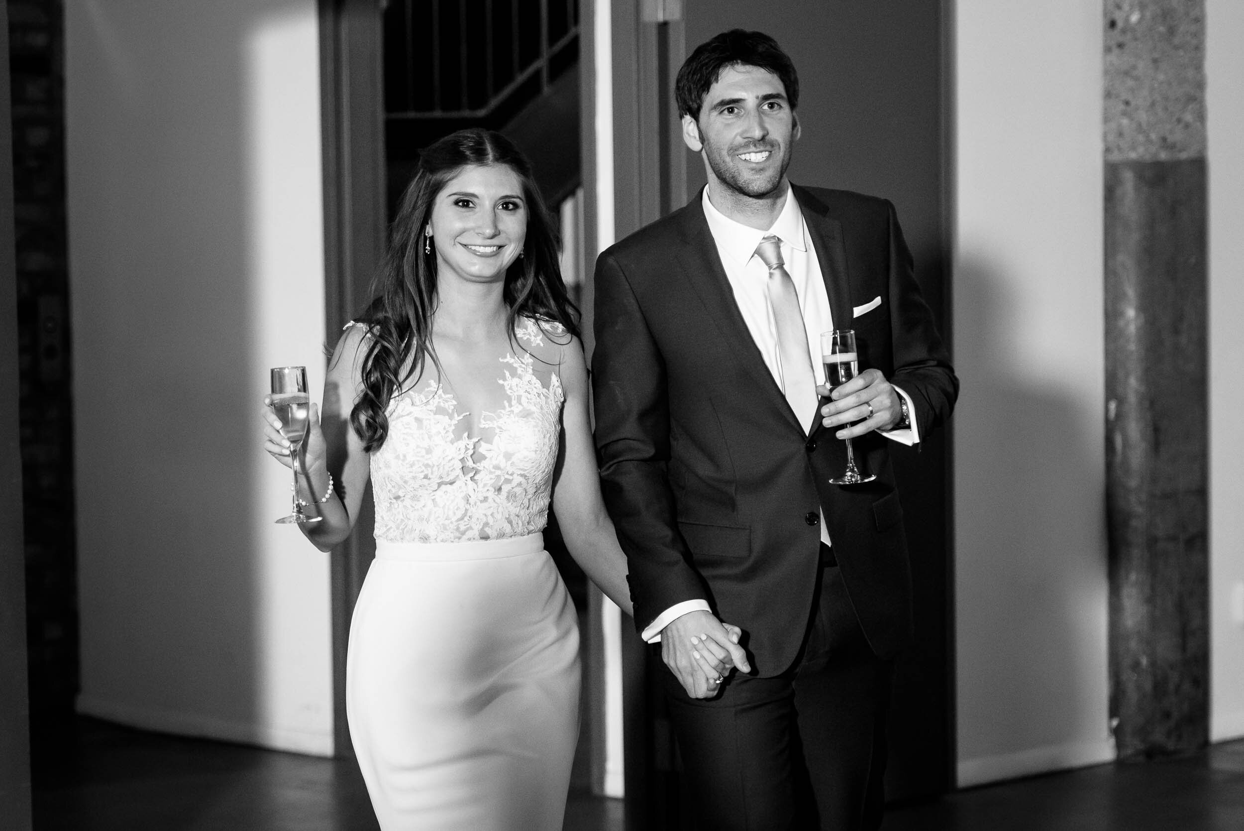 Bride and groom introduced into the reception: Ravenswood Event Center Chicago wedding captured by J. Brown Photography.  