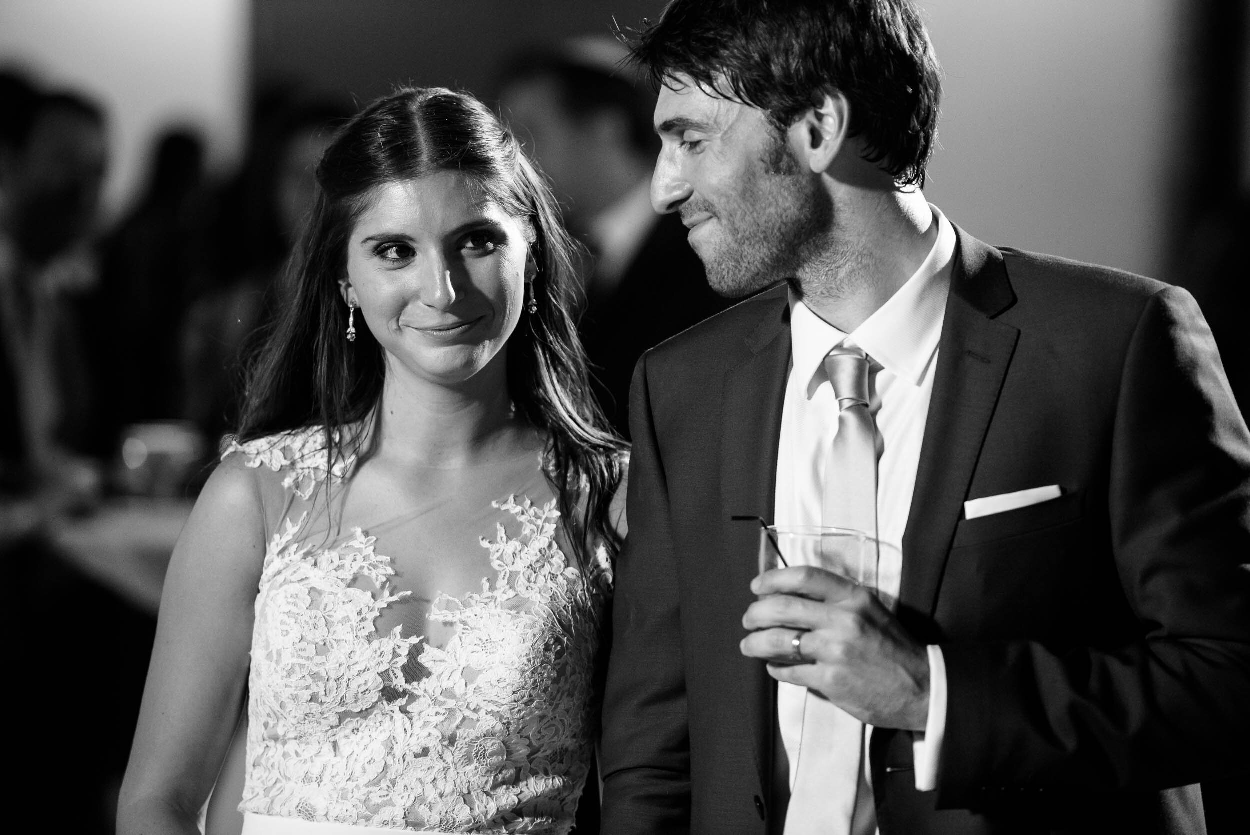 Bride and groom react during the toasts at their reception: Ravenswood Event Center Chicago wedding captured by J. Brown Photography.  