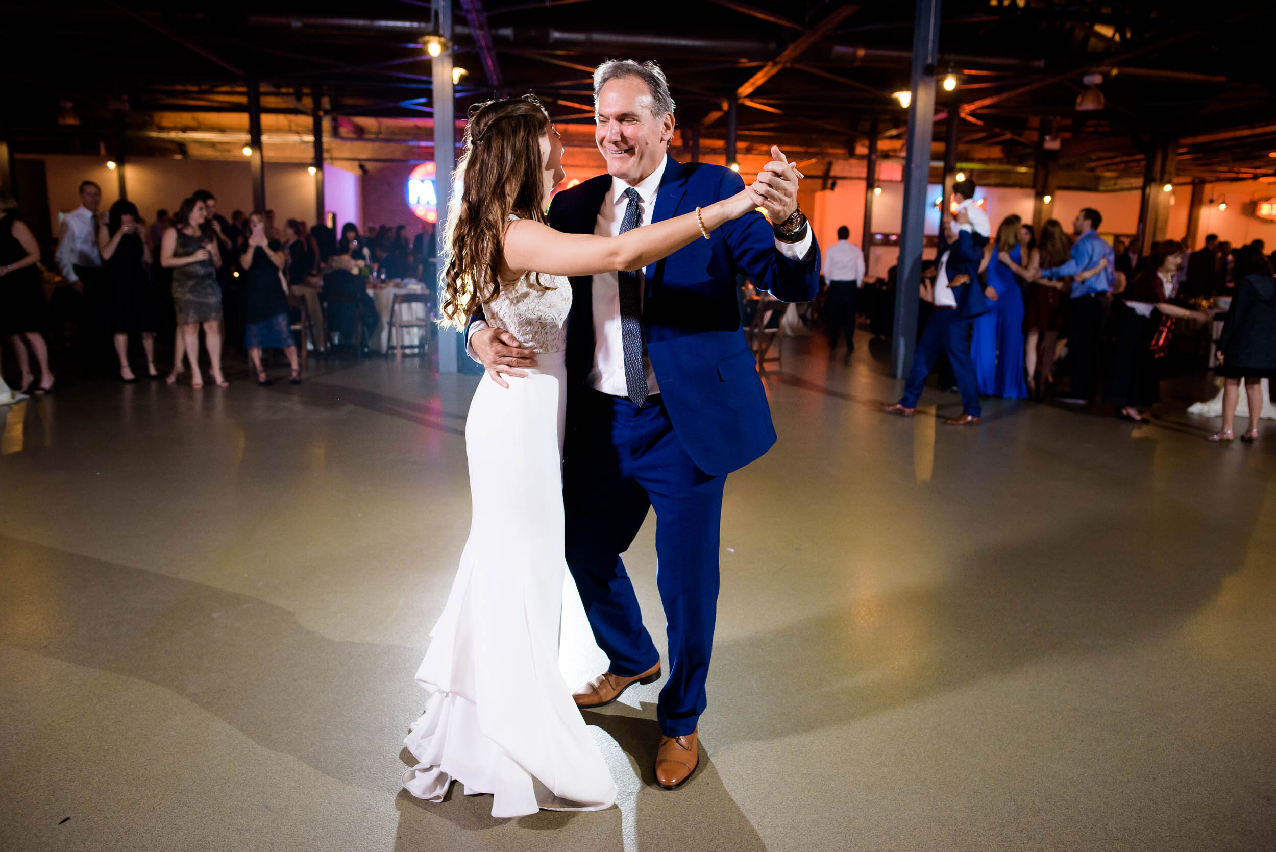 Bride dances with her father during the reception: Ravenswood Event Center Chicago wedding captured by J. Brown Photography.  