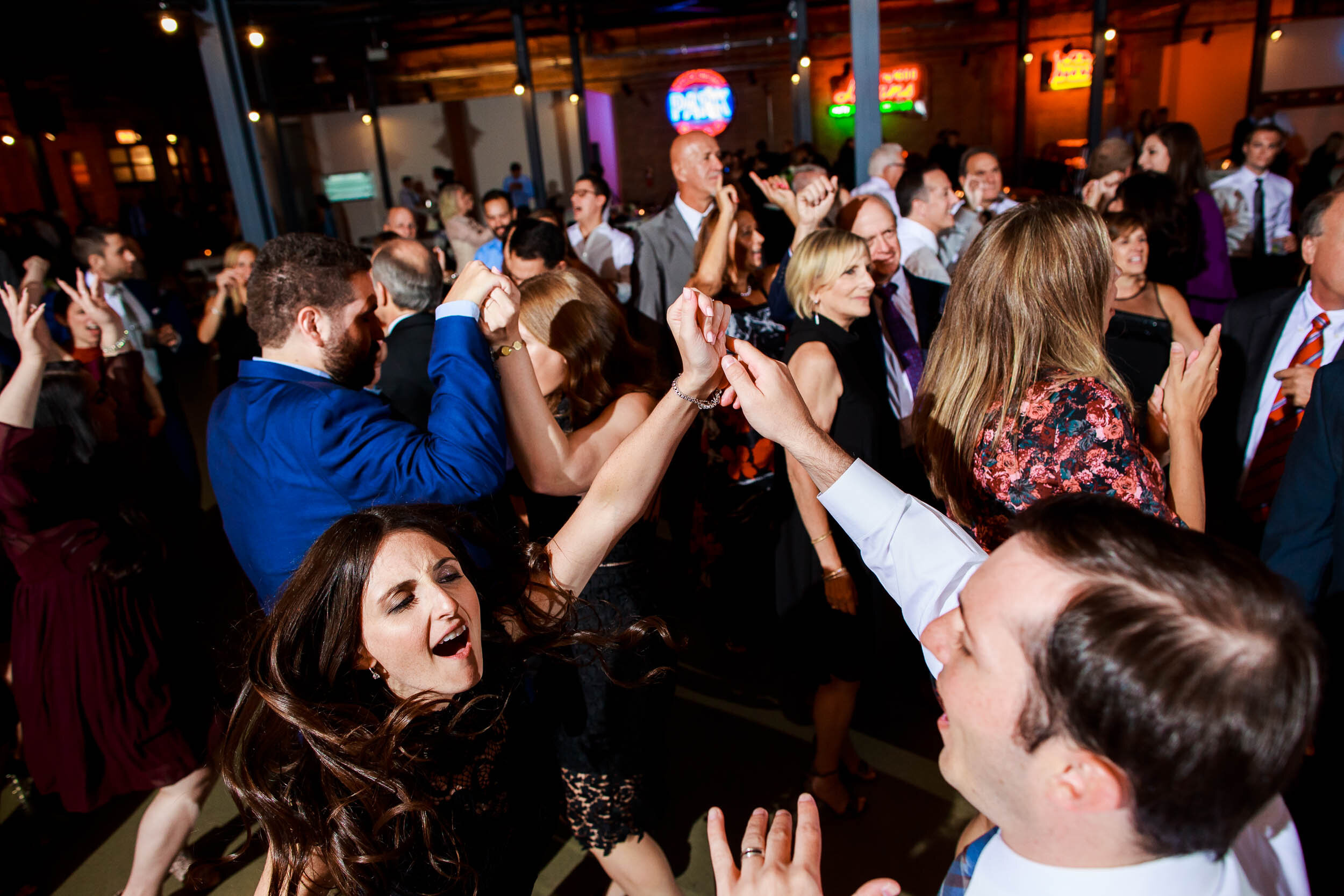 Packed dance floor during a wedding reception: Ravenswood Event Center Chicago wedding captured by J. Brown Photography.  