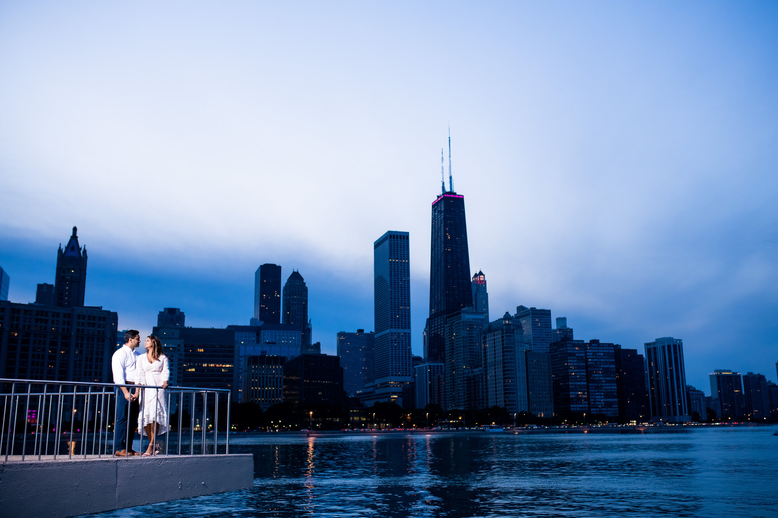 Sunset engagement photo at Milton Olive Park with the Chicago Skyline. 