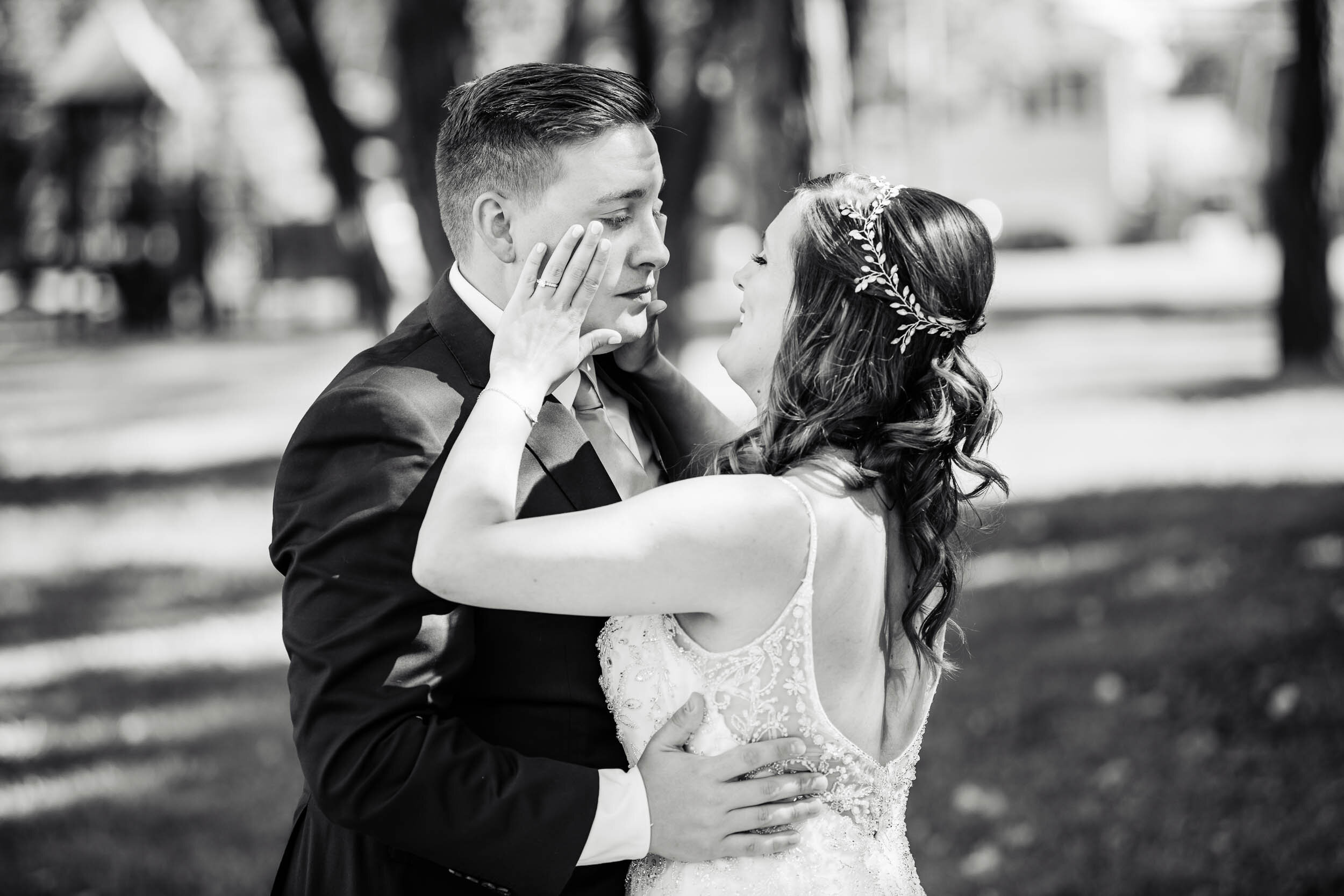 Groom and bride share an emotional moment:  Chicago backyard wedding photographed by J. Brown Photography.