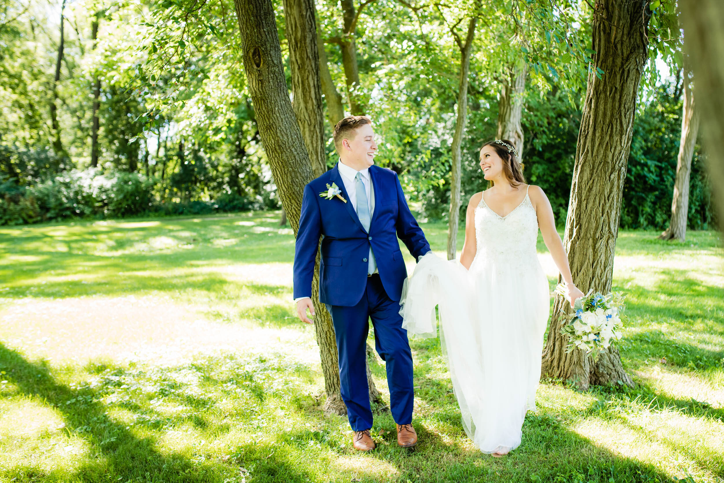 Bride and groom portrait at a park: Chicago backyard wedding photographed by J. Brown Photography.
