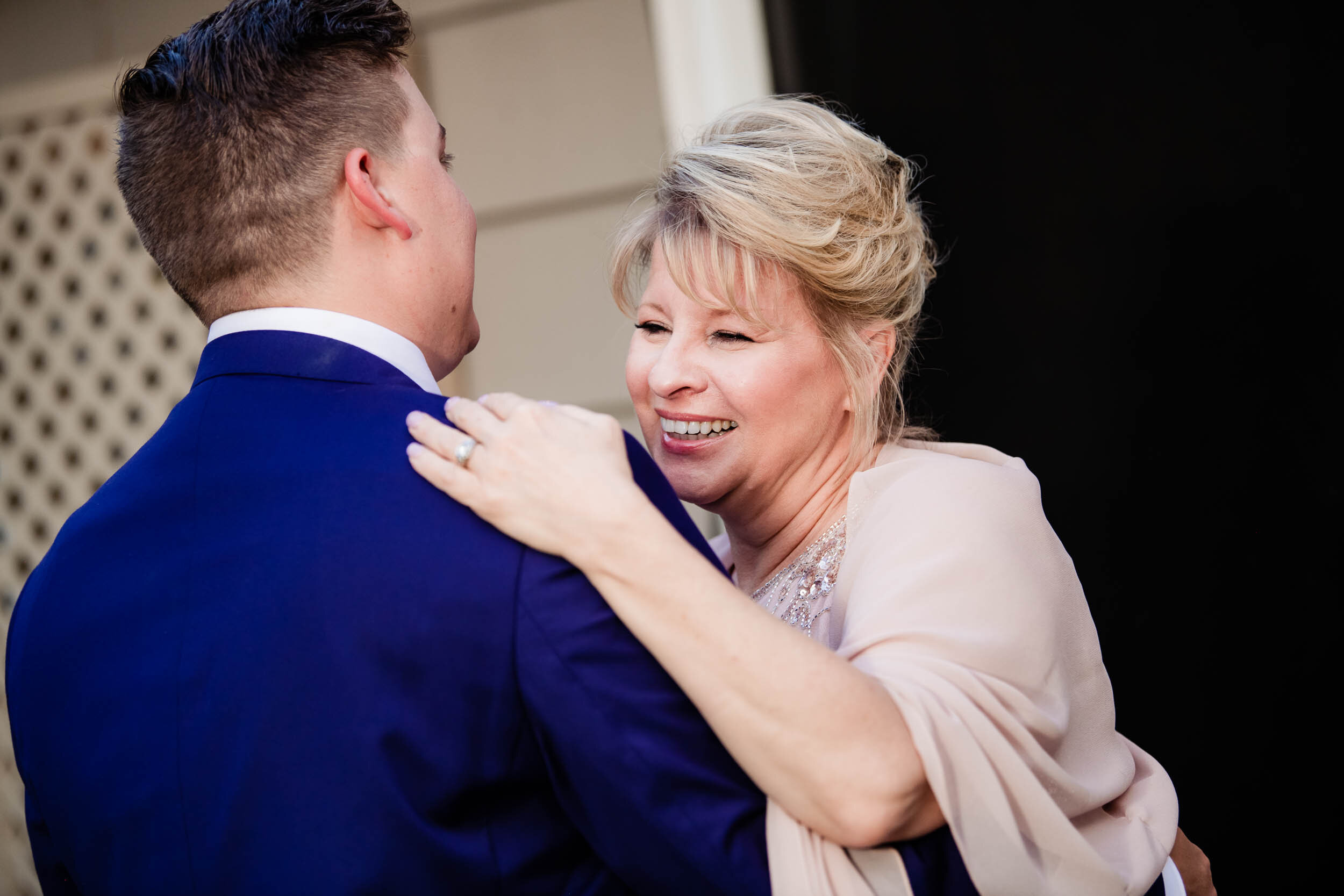 Mother and groom dance during the reception:  Chicago backyard wedding photographed by J. Brown Photography.