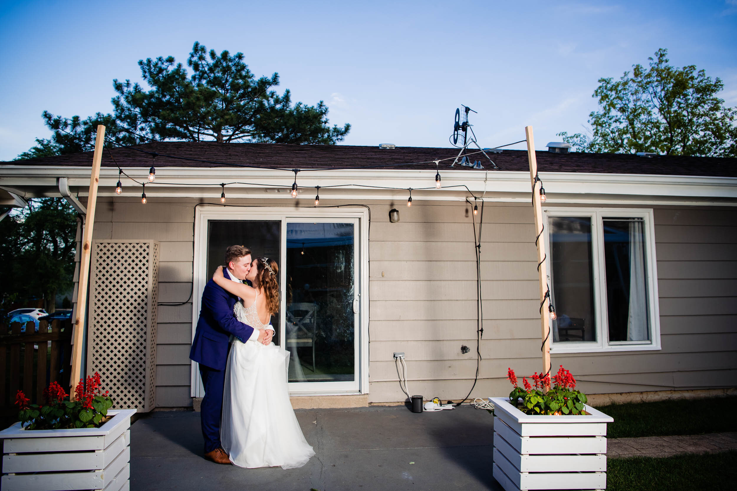 The couple's first dance outside their home:  Chicago backyard wedding photographed by J. Brown Photography.