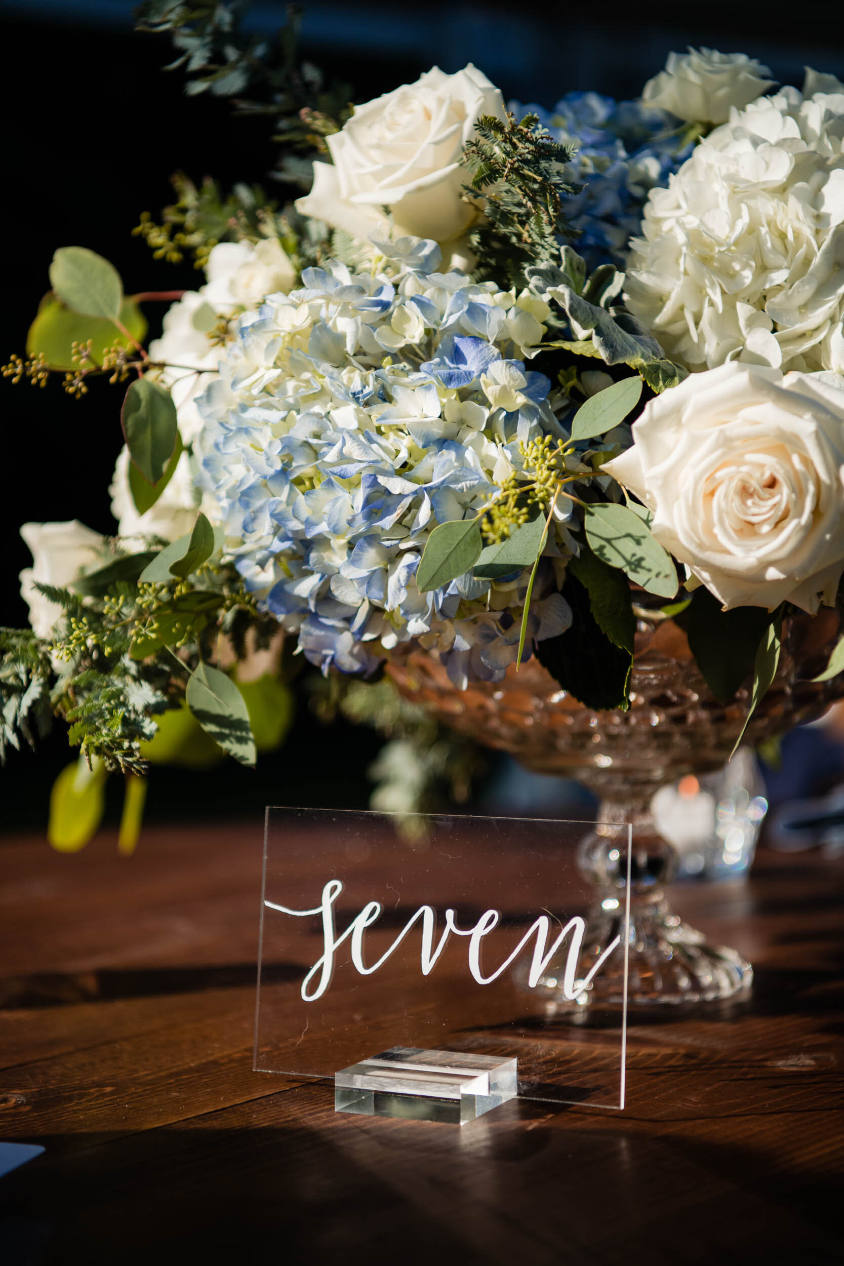 Table marker and floral detail photo:  Chicago backyard wedding photographed by J. Brown Photography.