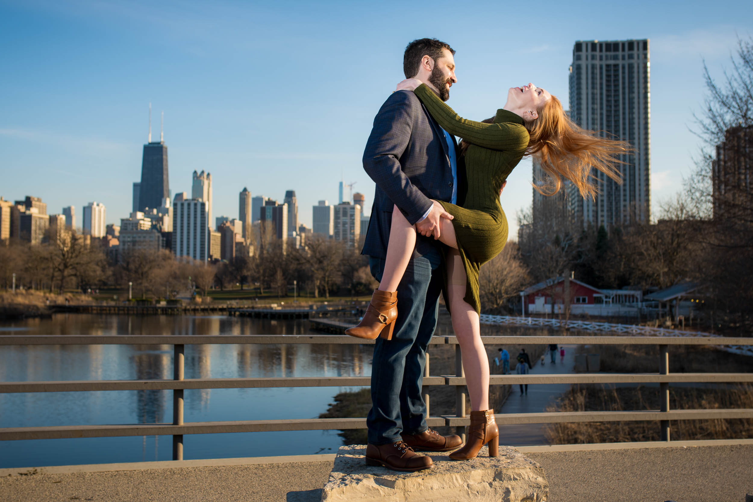 Fun photo of bride tossing her head back:  Chicago engagement photo by J. Brown Photography.