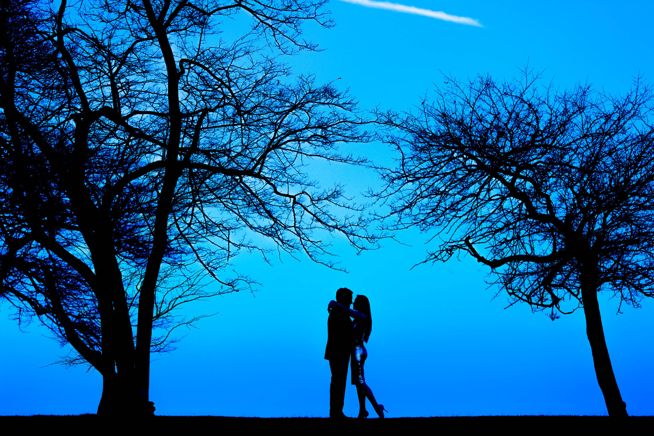 Silouette at the bride and groom at North Avenue Beach:  Chicago engagement photo by J. Brown Photography.