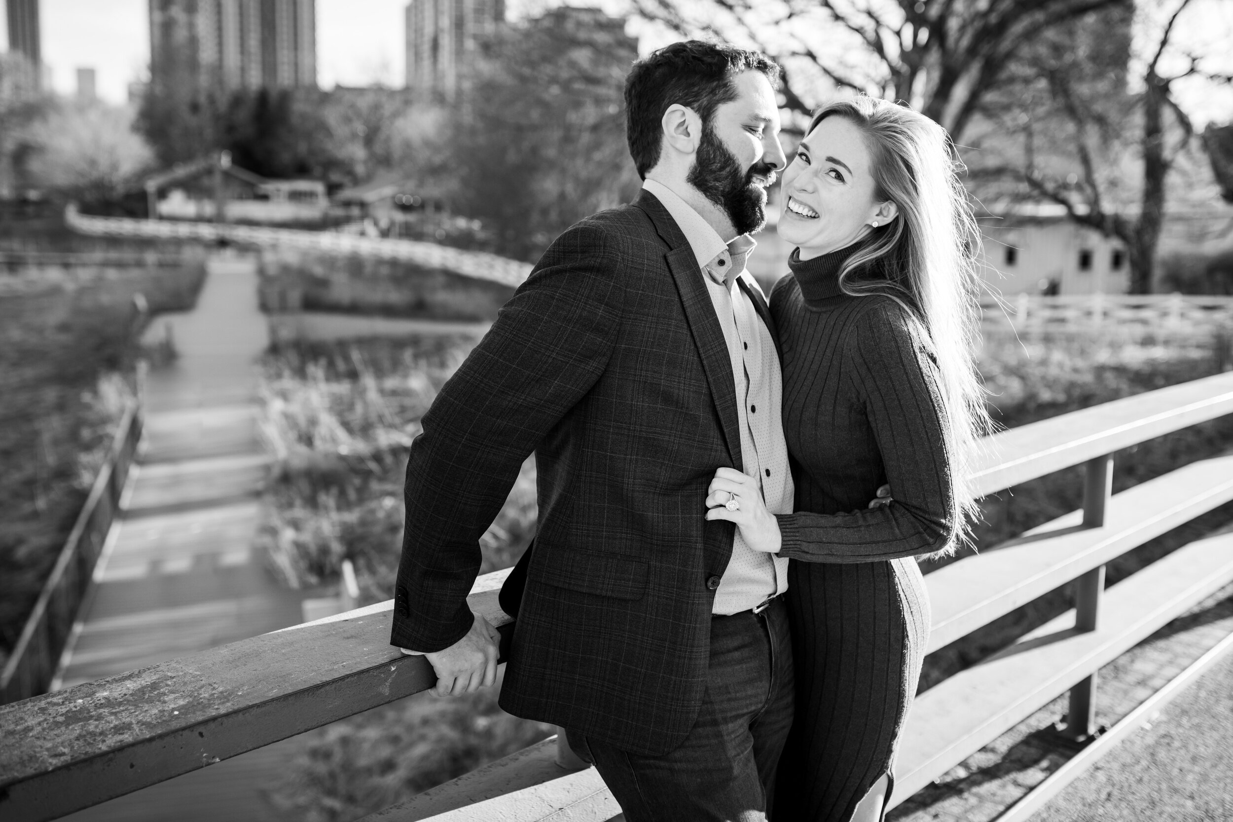 Fun moment with the couple at Lincoln Park:  Chicago engagement photo by J. Brown Photography.