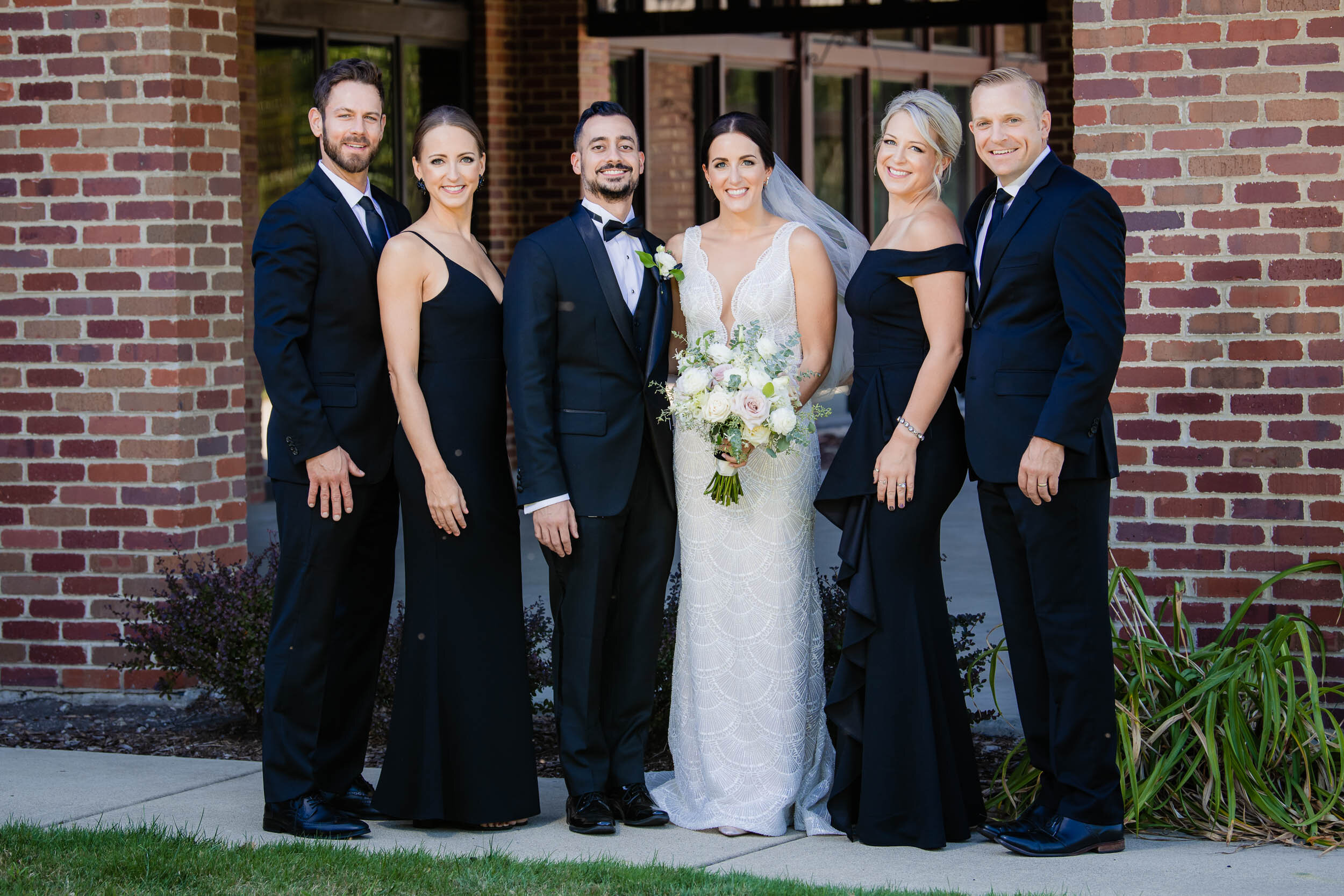 Wedding day portrait with family: Chicago wedding photography by J. Brown Photography.