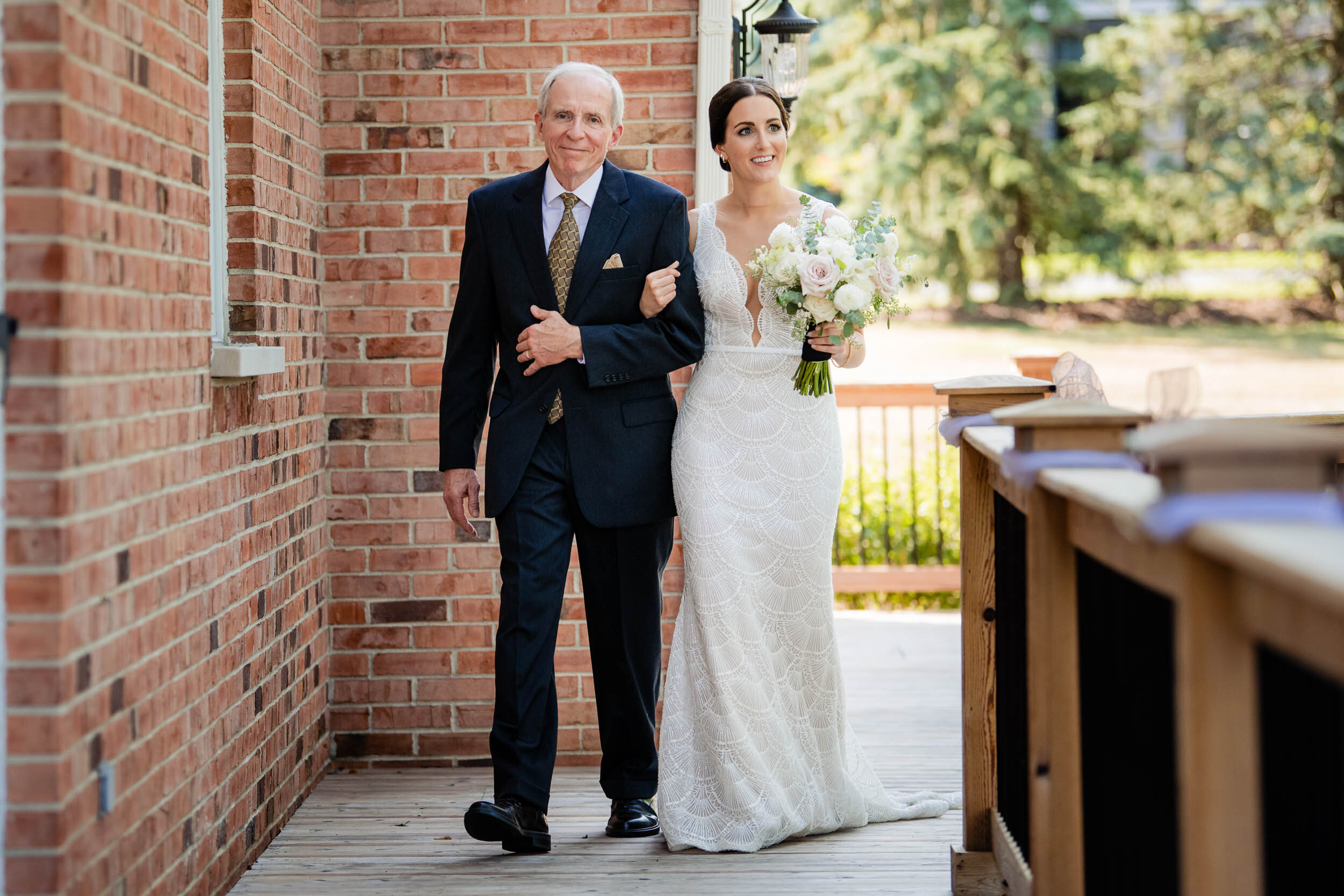 Bride and father walk down the aisle:  Chicago wedding photography by J. Brown Photography.