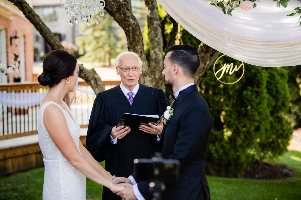 Backyard wedding ceremony:  Chicago wedding photography by J. Brown Photography.