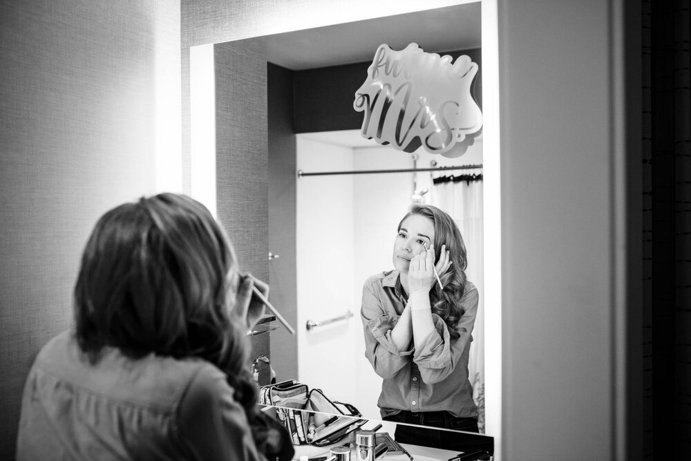 Bride getting ready on her own:  Chicago wedding photographs by J. Brown Photography.
