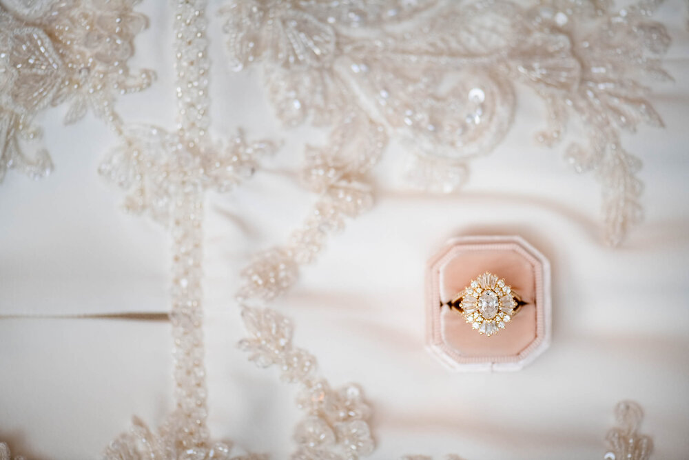 Creative detail photo of the bride's engagement ring:  Chicago wedding photographs by J. Brown Photography.