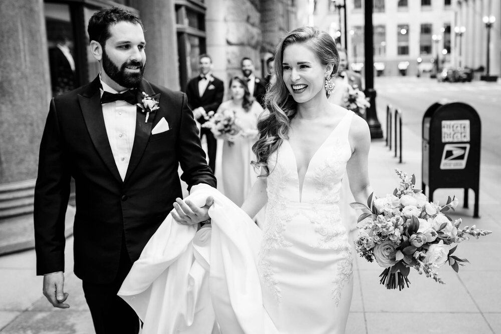 Fun candid moment with the couple and wedding party:  Chicago wedding photographs by J. Brown Photography.