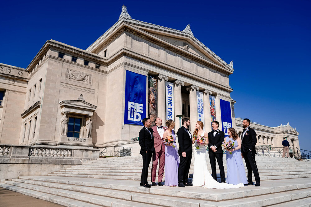Wedding party portrait on the steps of the Field Museum:  Chicago wedding photographs by J. Brown Photography.