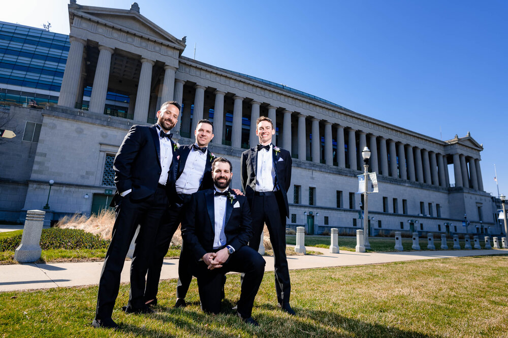 Groomsmen portrait outside Soldier Field:  Chicago wedding photographs by J. Brown Photography.