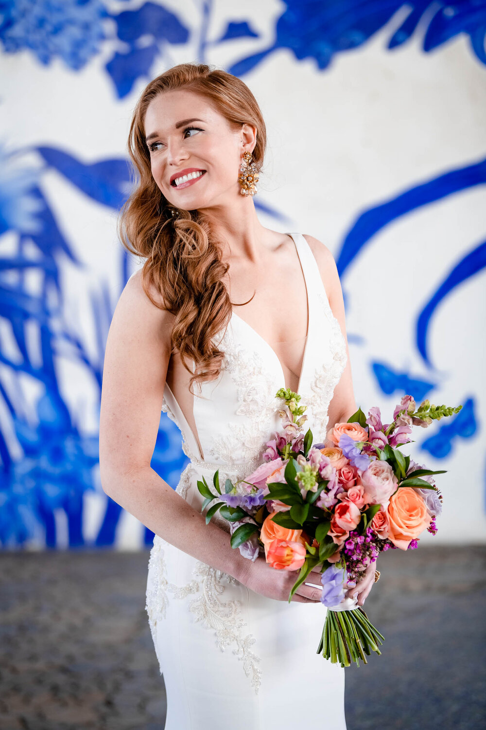Beautiful portrait of the bride with street art at Ping Tom Park:  Chicago wedding photographs by J. Brown Photography.