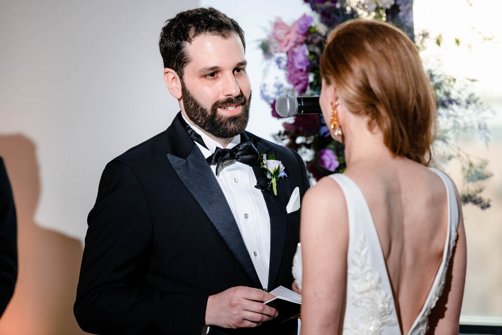 Groom says his vows during the ceremony at the Stockhouse: Chicago wedding photographs by J. Brown Photography.