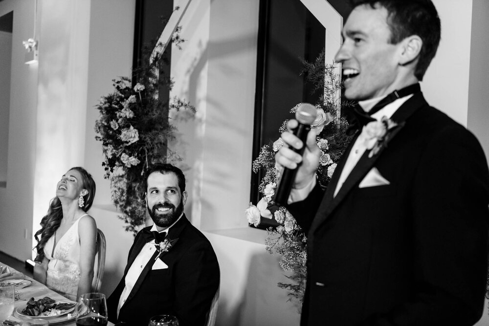 Best man speech during a reception at the Stockhouse:  Chicago wedding photographs by J. Brown Photography.