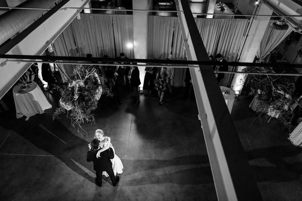 Creative photo of the bride and groom's first dance at the Stockhouse: Chicago wedding photographs by J. Brown Photography.