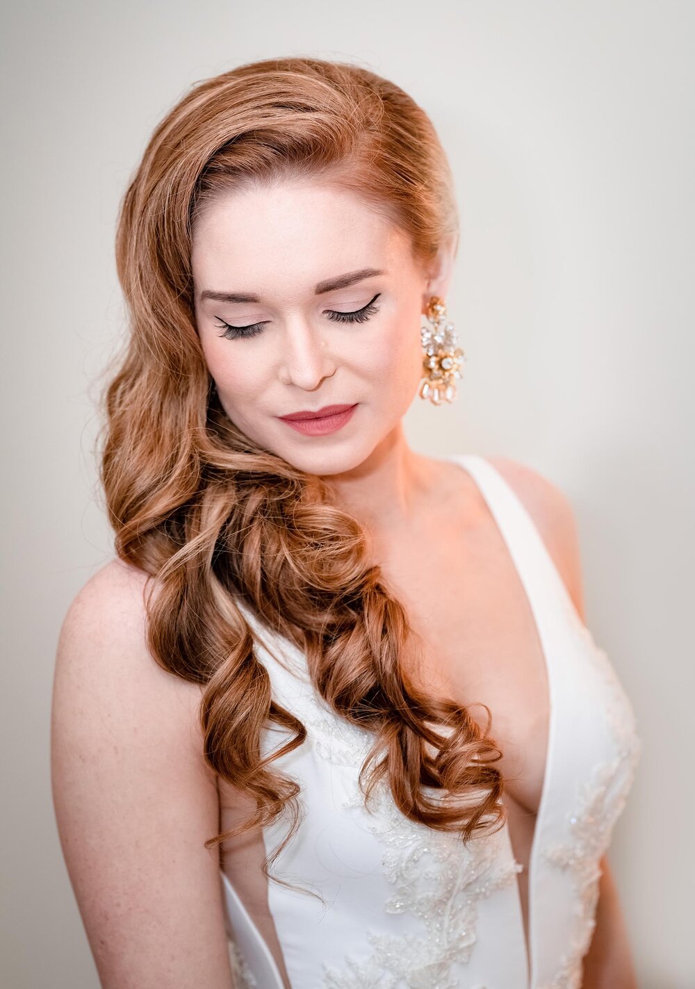 Bridal portrait while getting ready:  Chicago wedding photographs by J. Brown Photography.