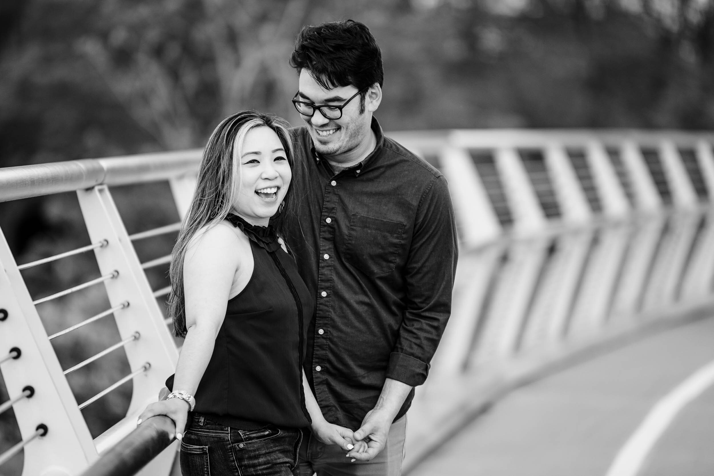Best Engagement Photographers Near Me | Milton Lee Olive Park | J. Brown Photography | black and white photo of couple on bike path.