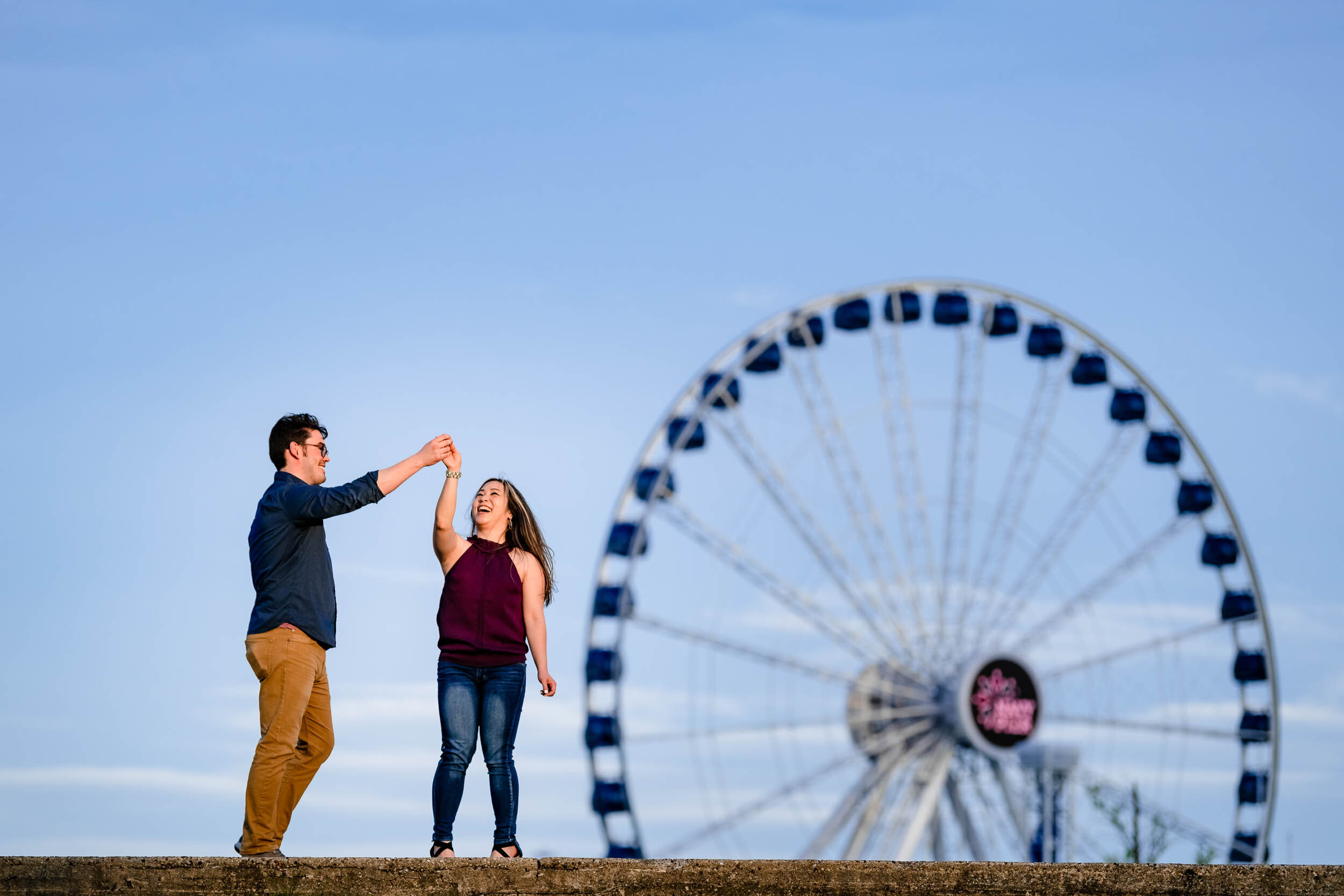 Chicago Wedding Photographer | Milton Lee Olive Park | J. Brown Photography | fun photo of groom spinning the bride.