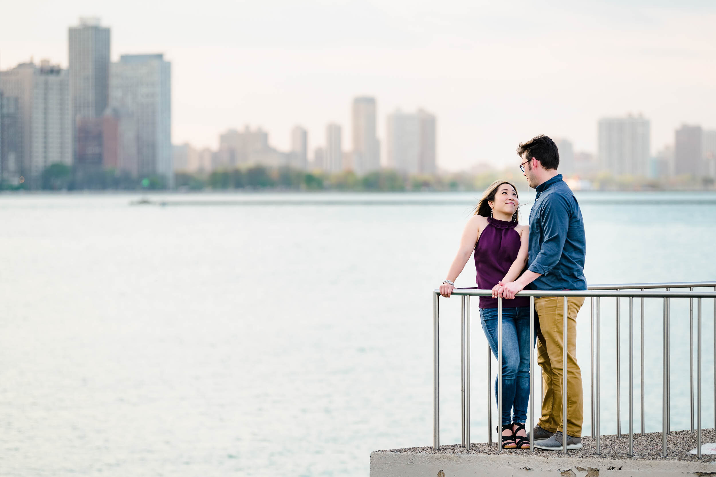 Engagement Photographer Chicago | Milton Lee Olive Park | J. Brown Photography | portrait of the couple over on the lake. 