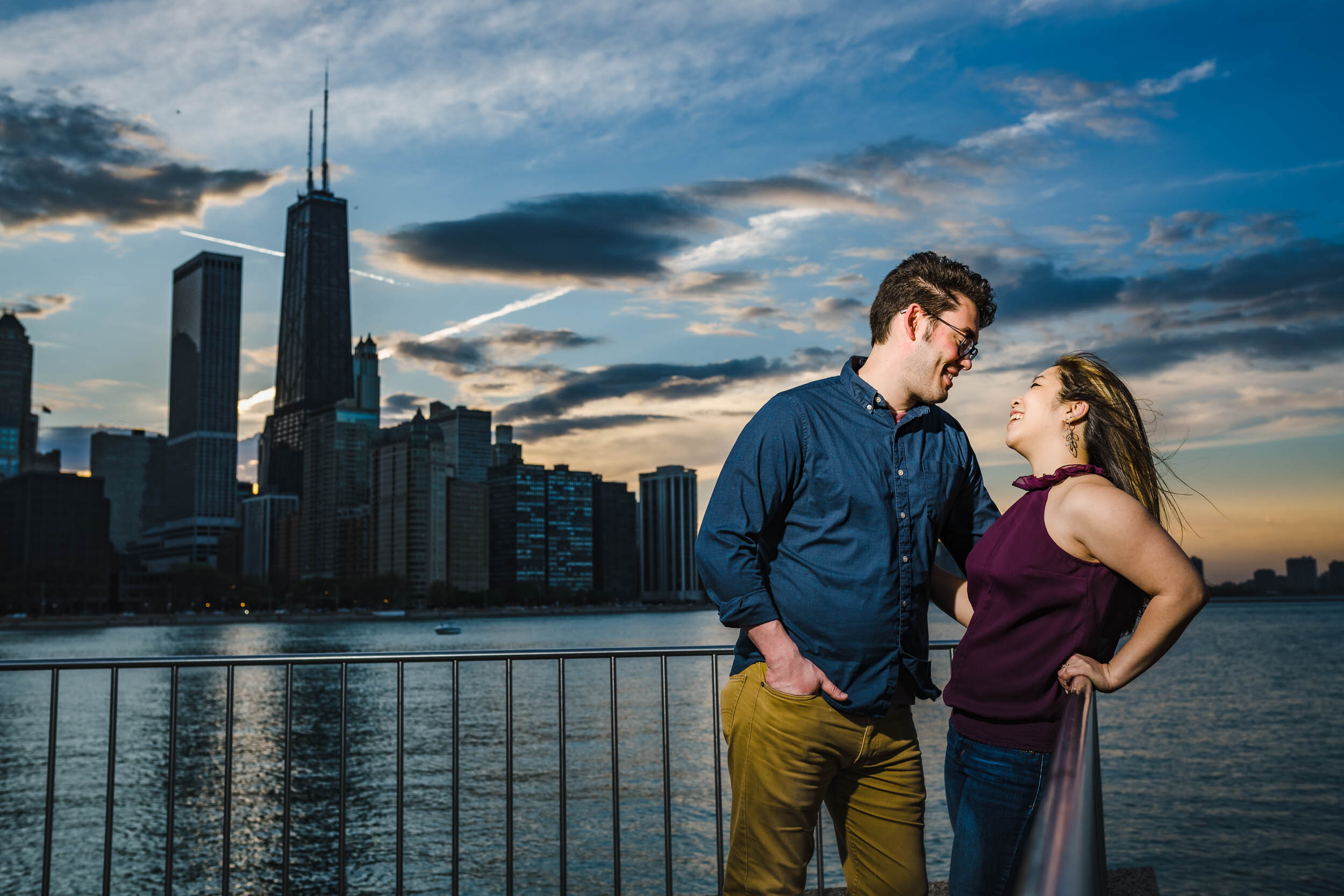 Best Engagement Photographers Near Me | Milton Lee Olive Park | J. Brown Photography | portrait with the Chicago skyline at sunset.