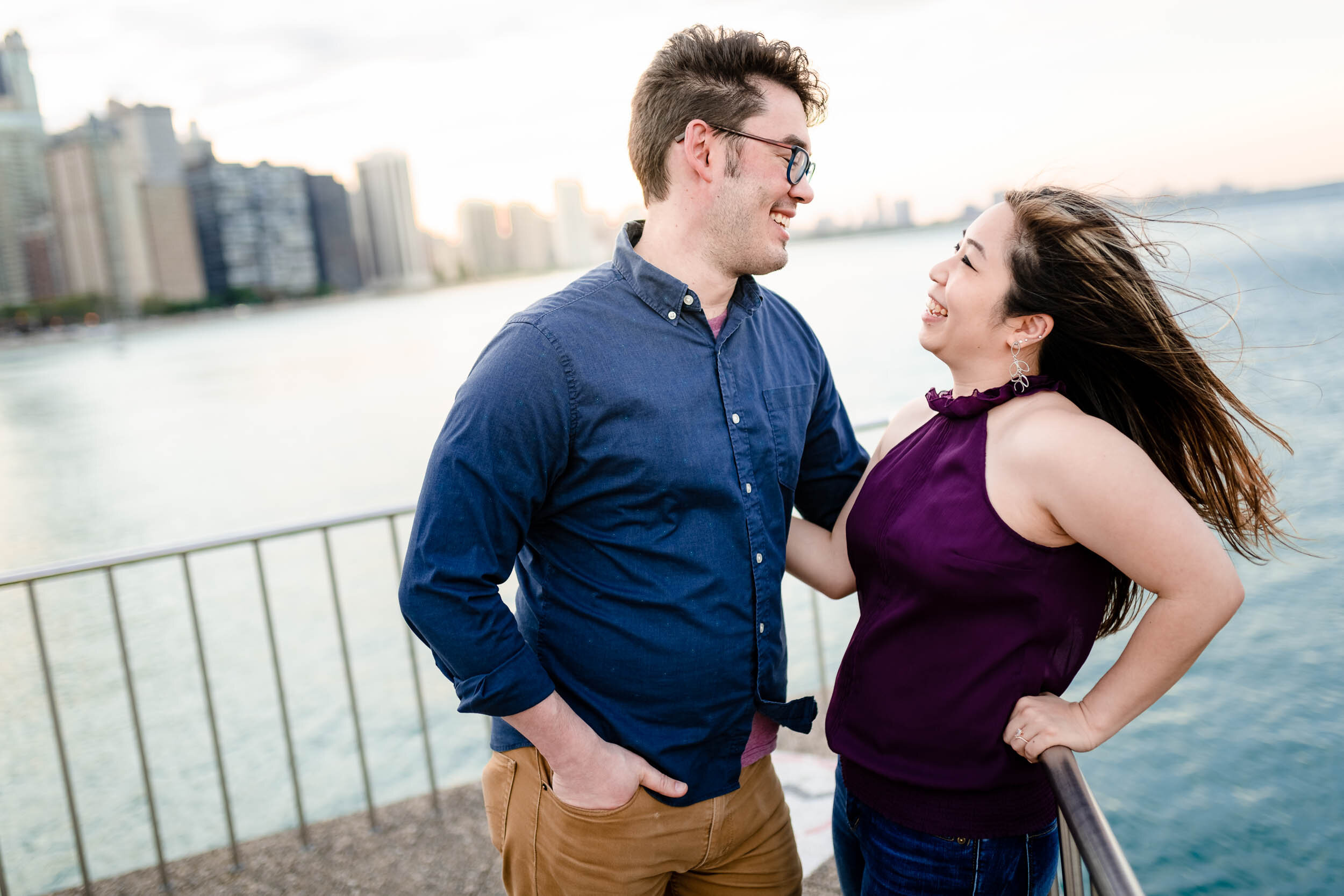 Engagement Photographer Chicago | Milton Lee Olive Park | J. Brown Photography | photo of the couple laughing together.