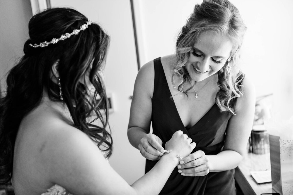 Wedding Day Photos | Ace Hotel | J. Brown Photography | maid of honor and bride getting ready.