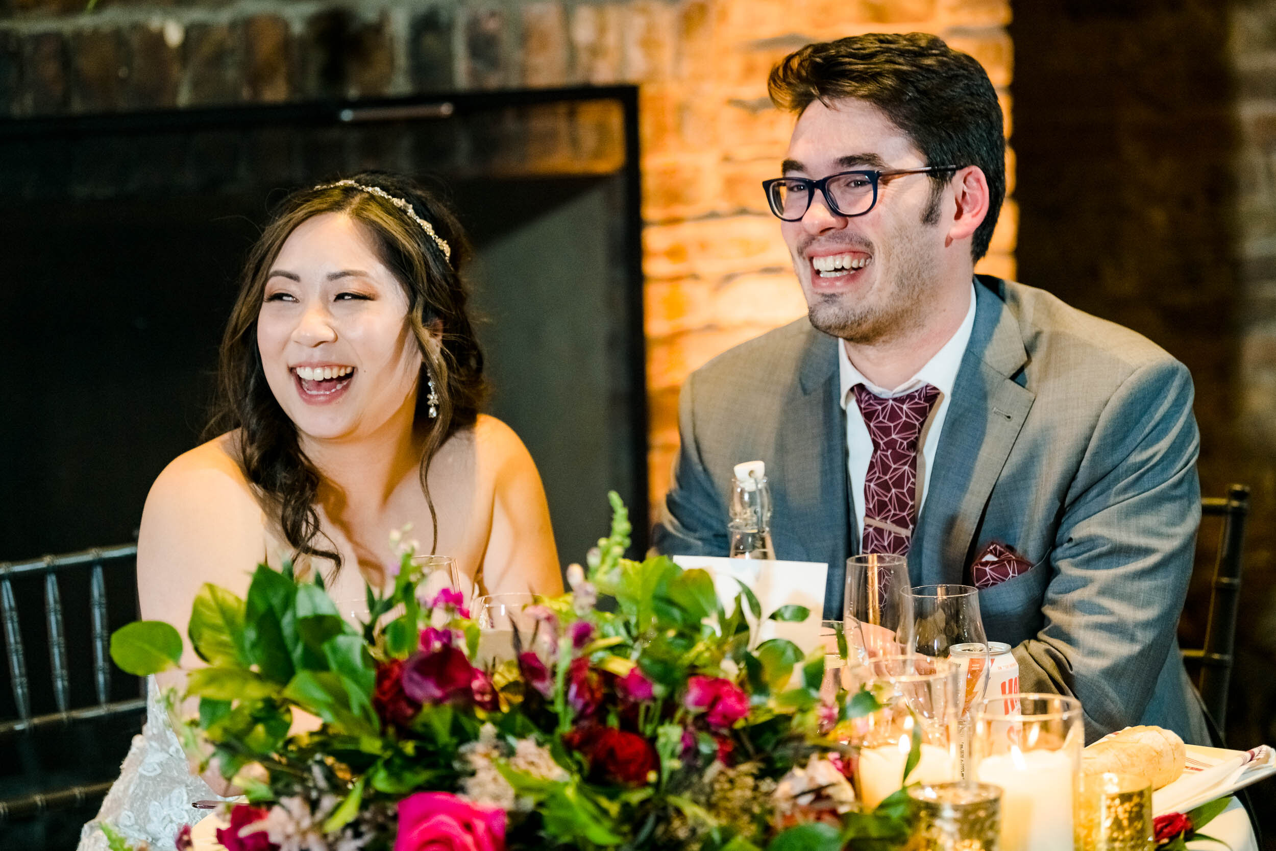 Wedding Day Photos | City Winery | J. Brown Photography | couple laughs during wedding party speeches.