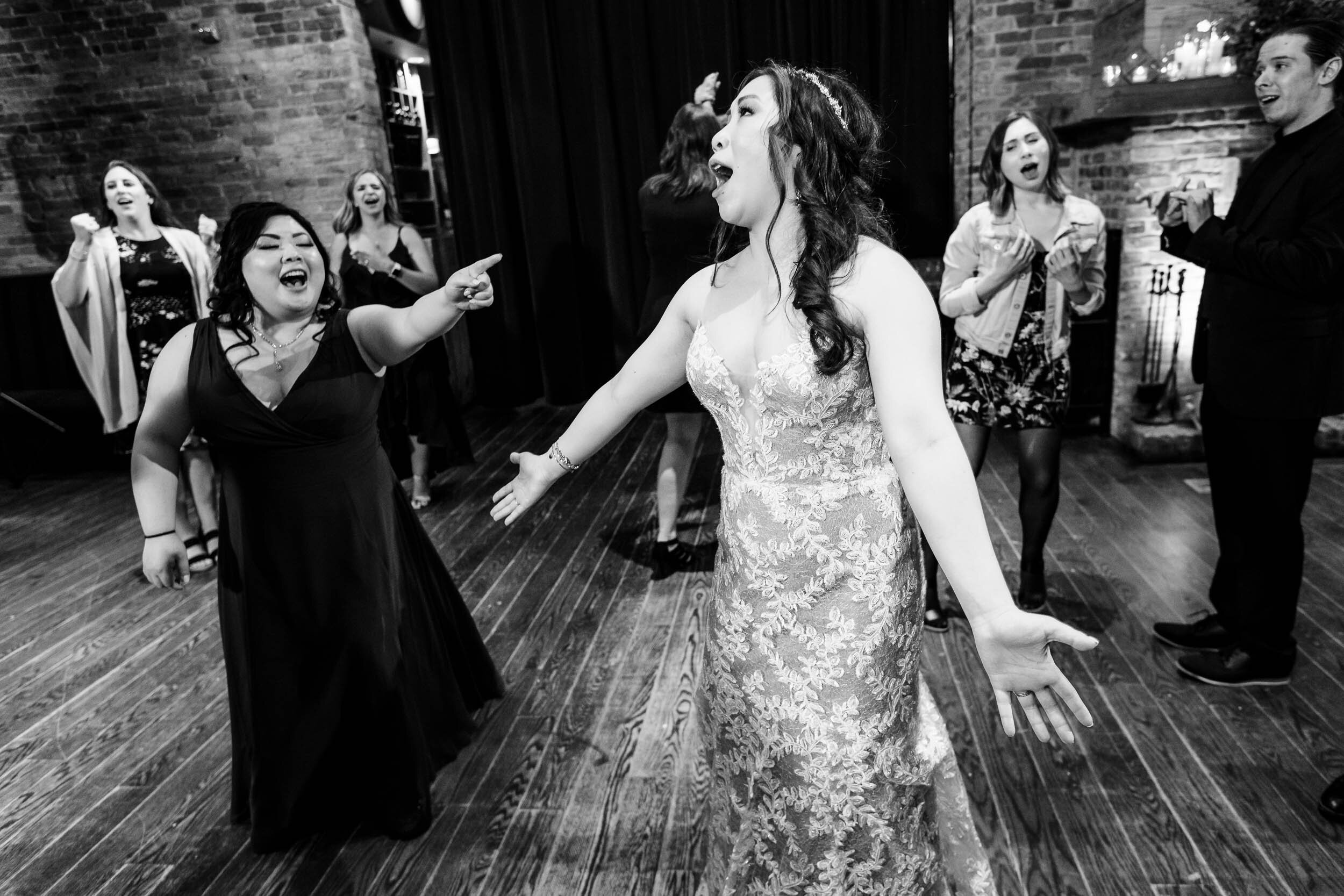 Top Wedding Photographers Near Me | City Winery | J. Brown Photography | bride sings on the dance floor.