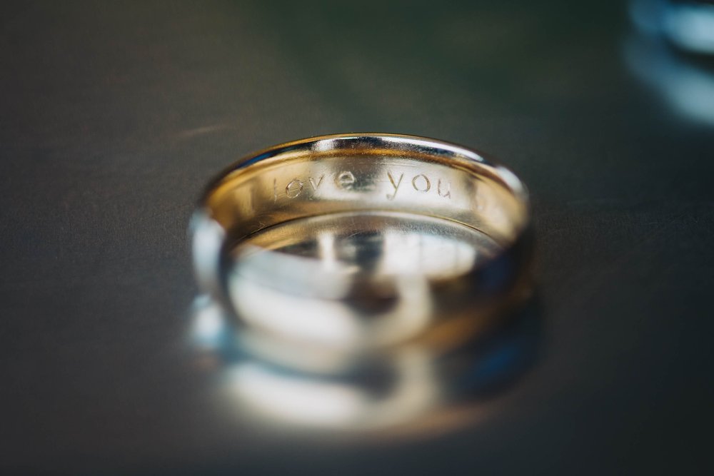 Top Wedding Photographers Near Me | Ravenswood Event Center | J. Brown Photography | wedding ring engraving