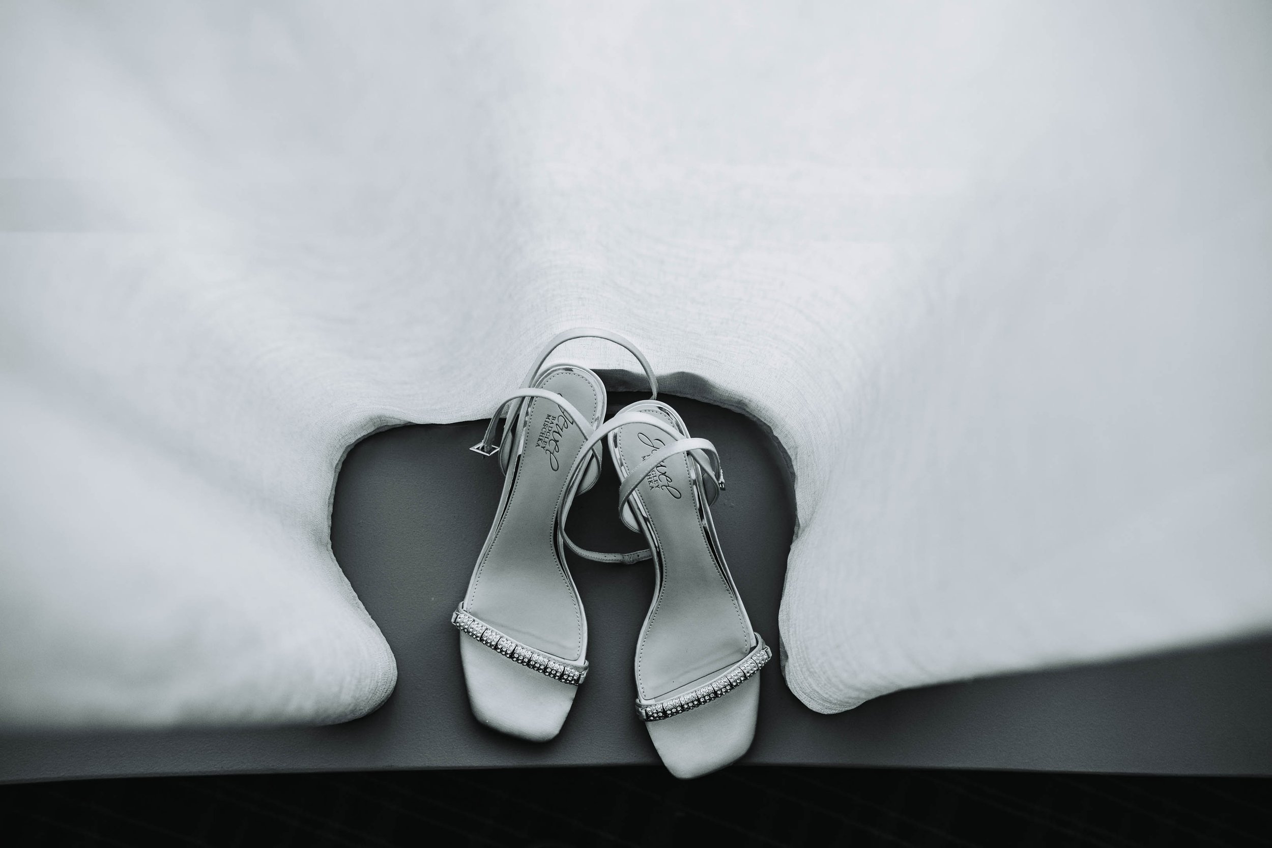 Top Wedding Photographers Near Me | Ravenswood Event Center | J. Brown Photography | detail photo of bride's shoes