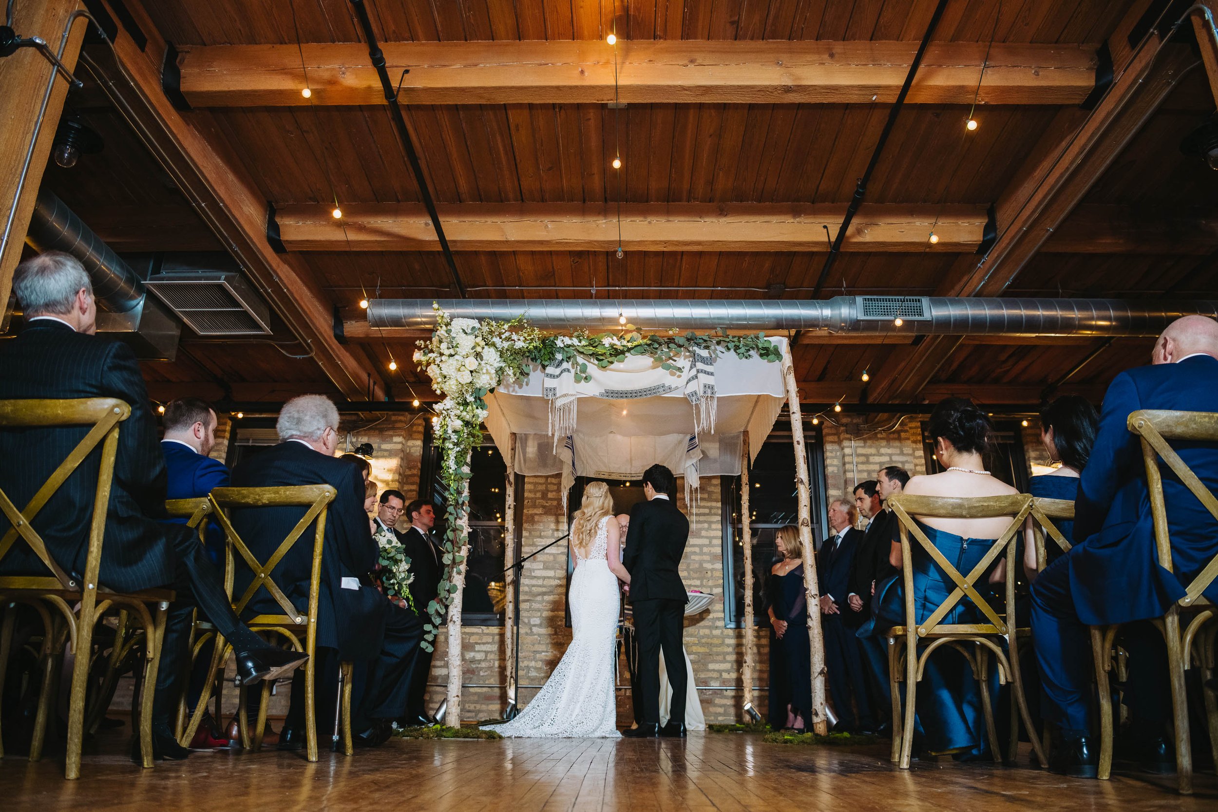 Top Wedding Photographers Near Me | Ravenswood Event Center | J. Brown Photography | indoor jewish wedding ceremony