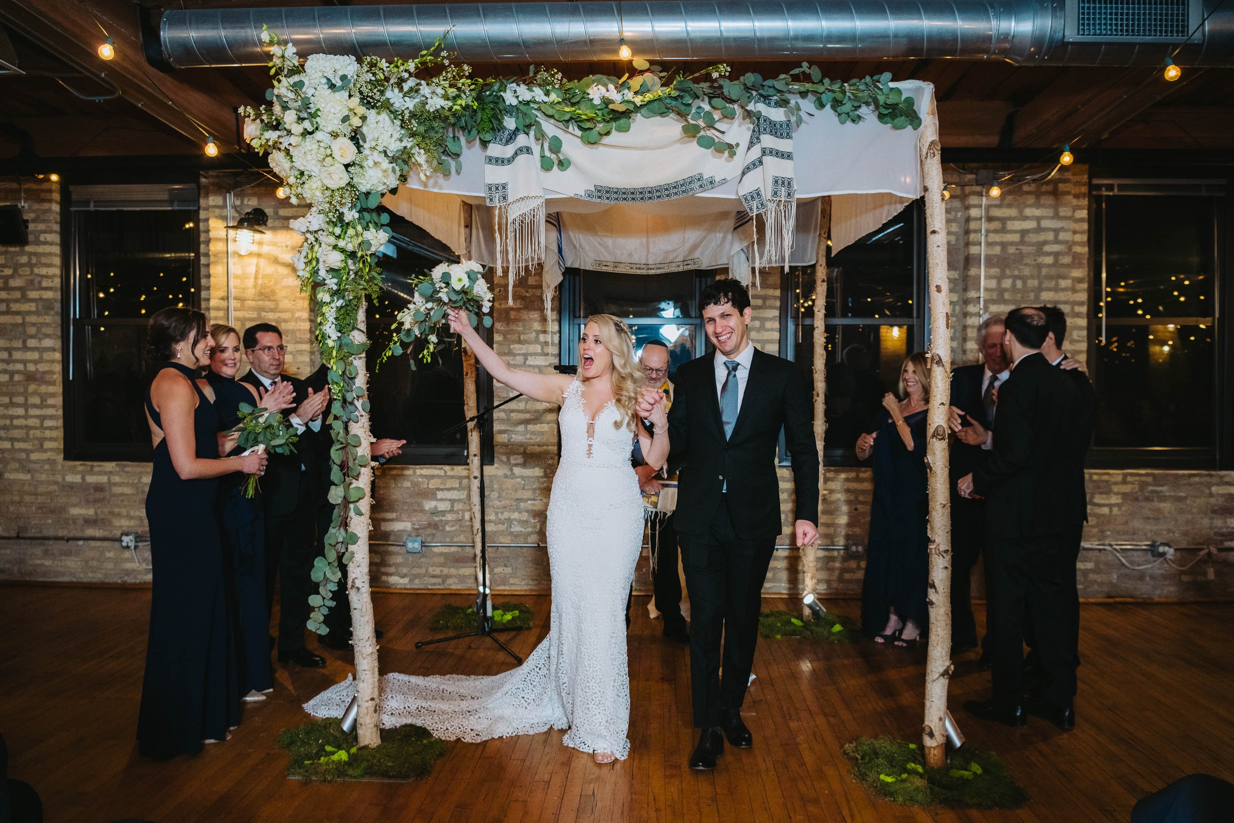 Top Wedding Photographers Near Me | Ravenswood Event Center | J. Brown Photography | bride and groom married under chuppah
