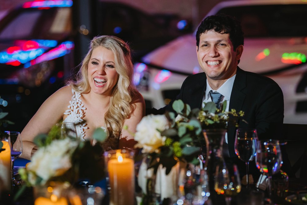 Top Wedding Photographers Near Me | Ravenswood Event Center | J. Brown Photography | couple laughs during toasts