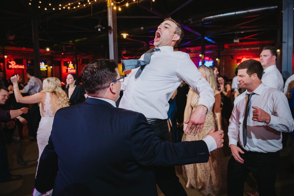 Chicago Wedding Photographer | Ravenswood Event Center | J. Brown Photography | guests getting crazy on the dance floor