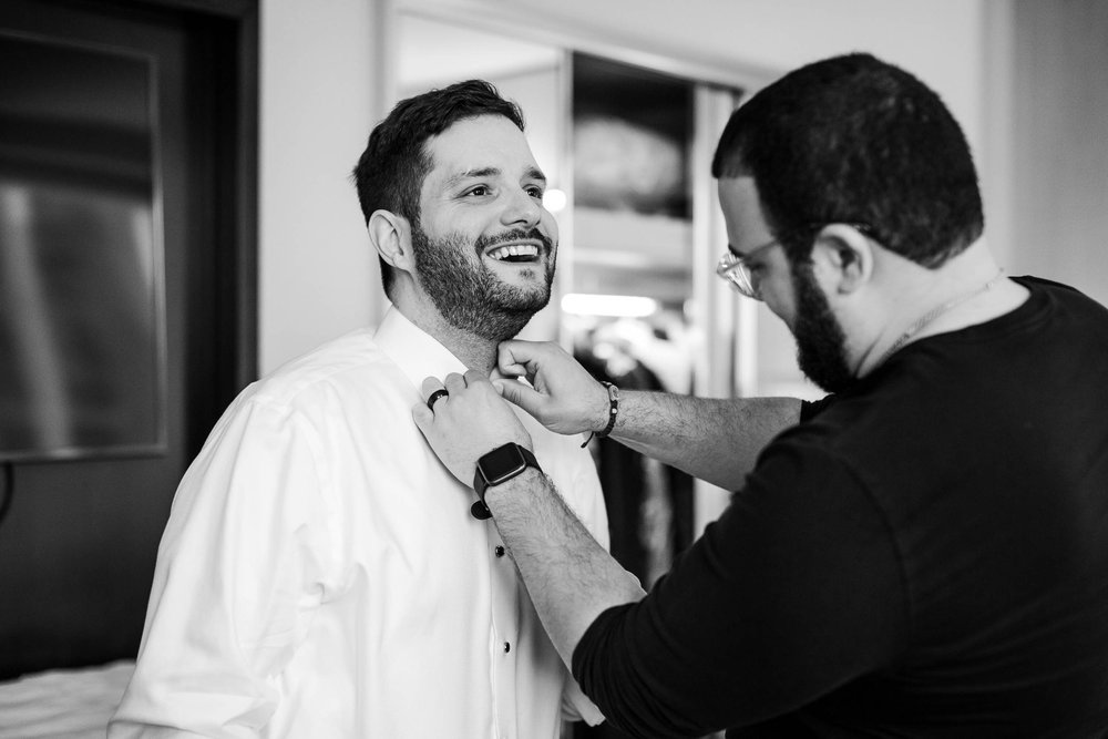 Best Wedding Photographers Near Me | Newberry Library | J. Brown Photography | groom getting ready on the wedding day. 