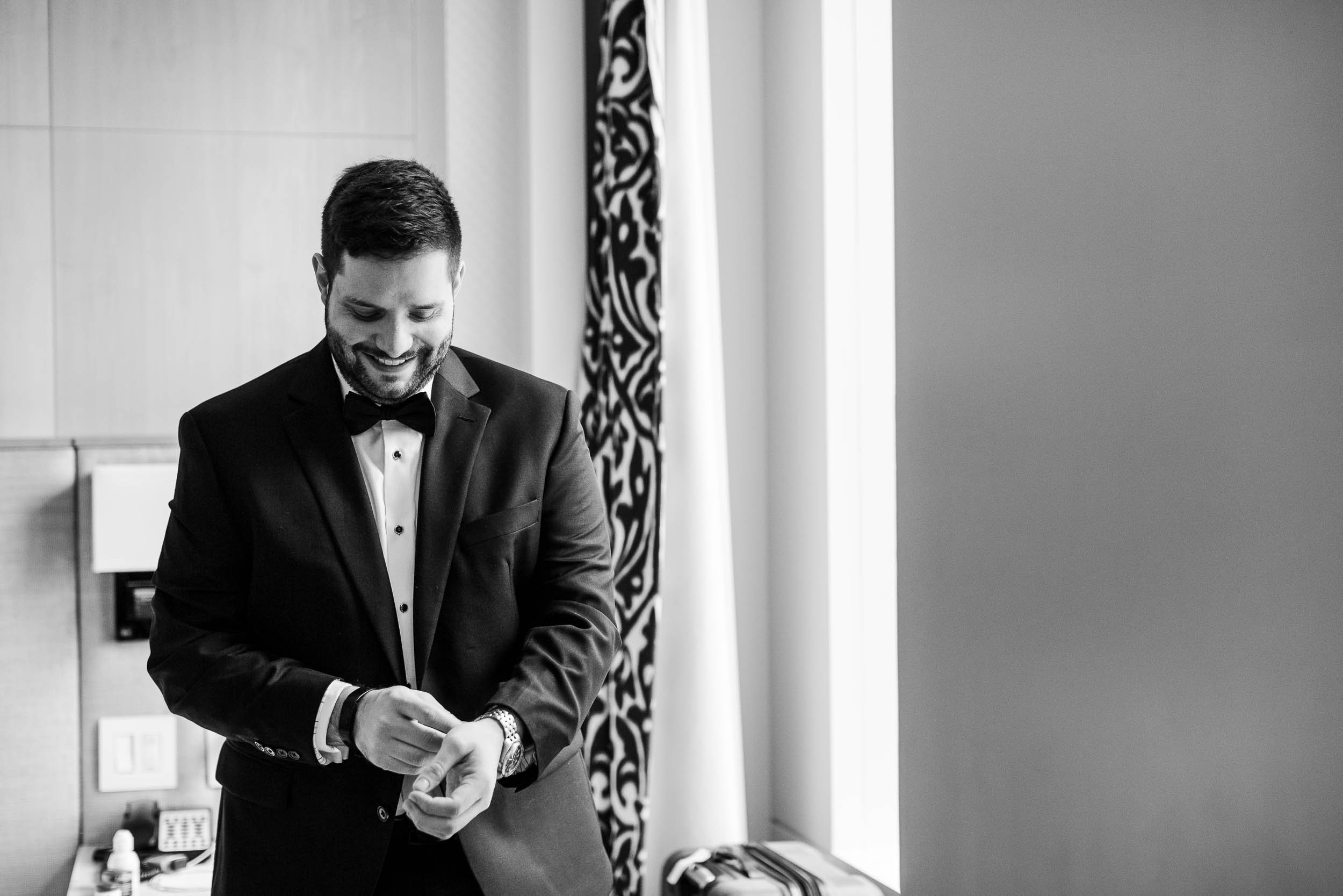 Chicago Wedding Photographer | Newberry Library | J. Brown Photography | groom getting ready on the wedding day. 