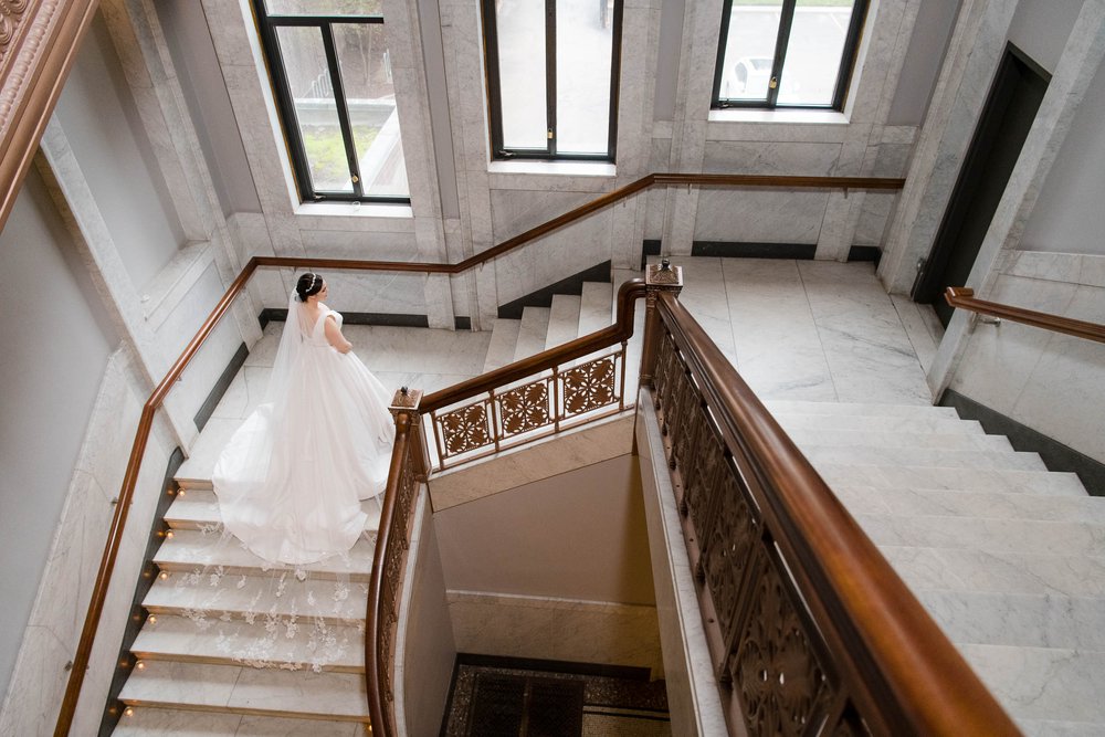 Chicago Wedding Photographer | Newberry Library | J. Brown Photography | portrait of bride on grand staircase.