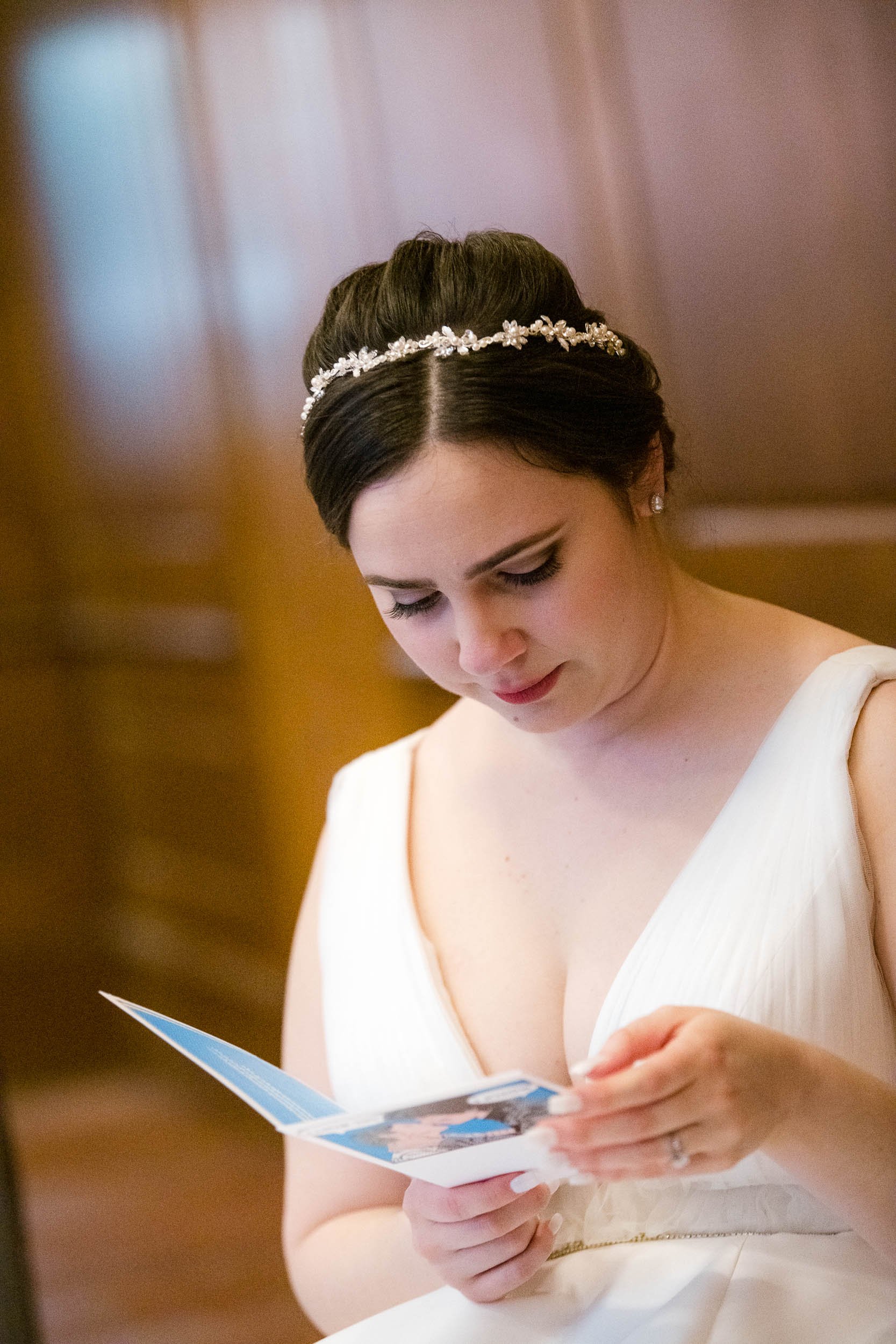 Chicago Wedding Photographer | Newberry Library | J. Brown Photography | bride reads note from groom. 