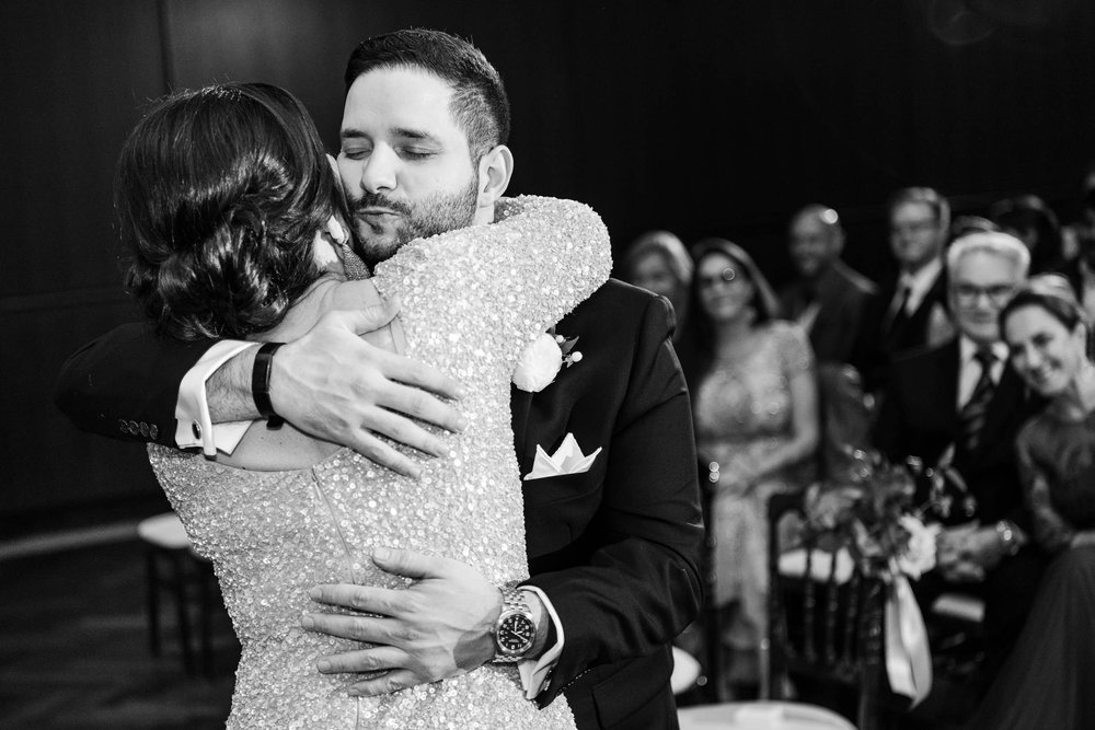 Chicago Wedding Photographer | Newberry Library | J. Brown Photography | groom hugs mom during ceremony. 