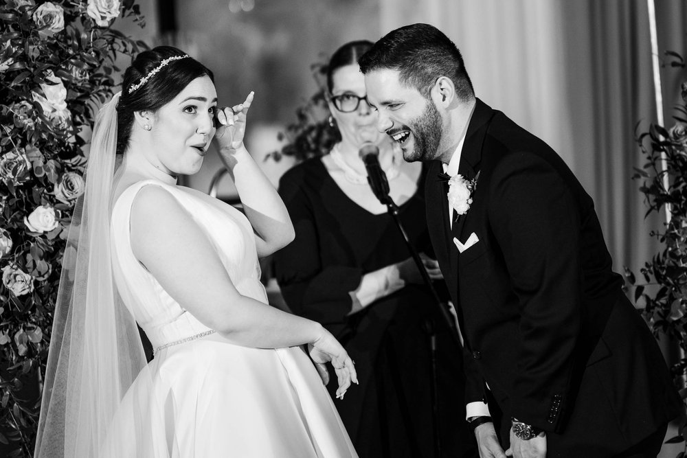 Best Wedding Photographers Near Me | Newberry Library | J. Brown Photography | bride and share a laugh during their ceremony.