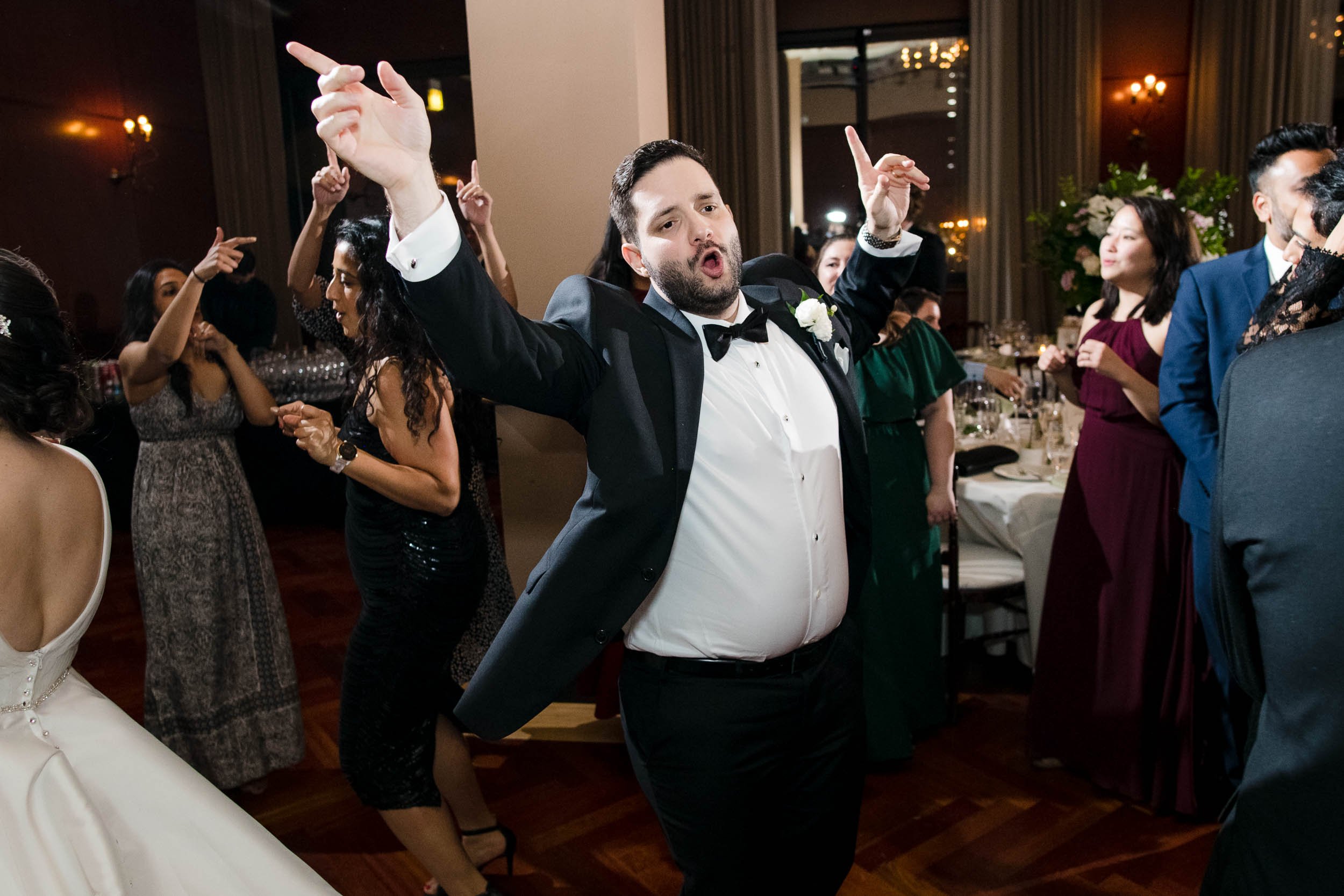 Best Wedding Photographers Near Me | Newberry Library | J. Brown Photography | funny photo of groom on dance floor.