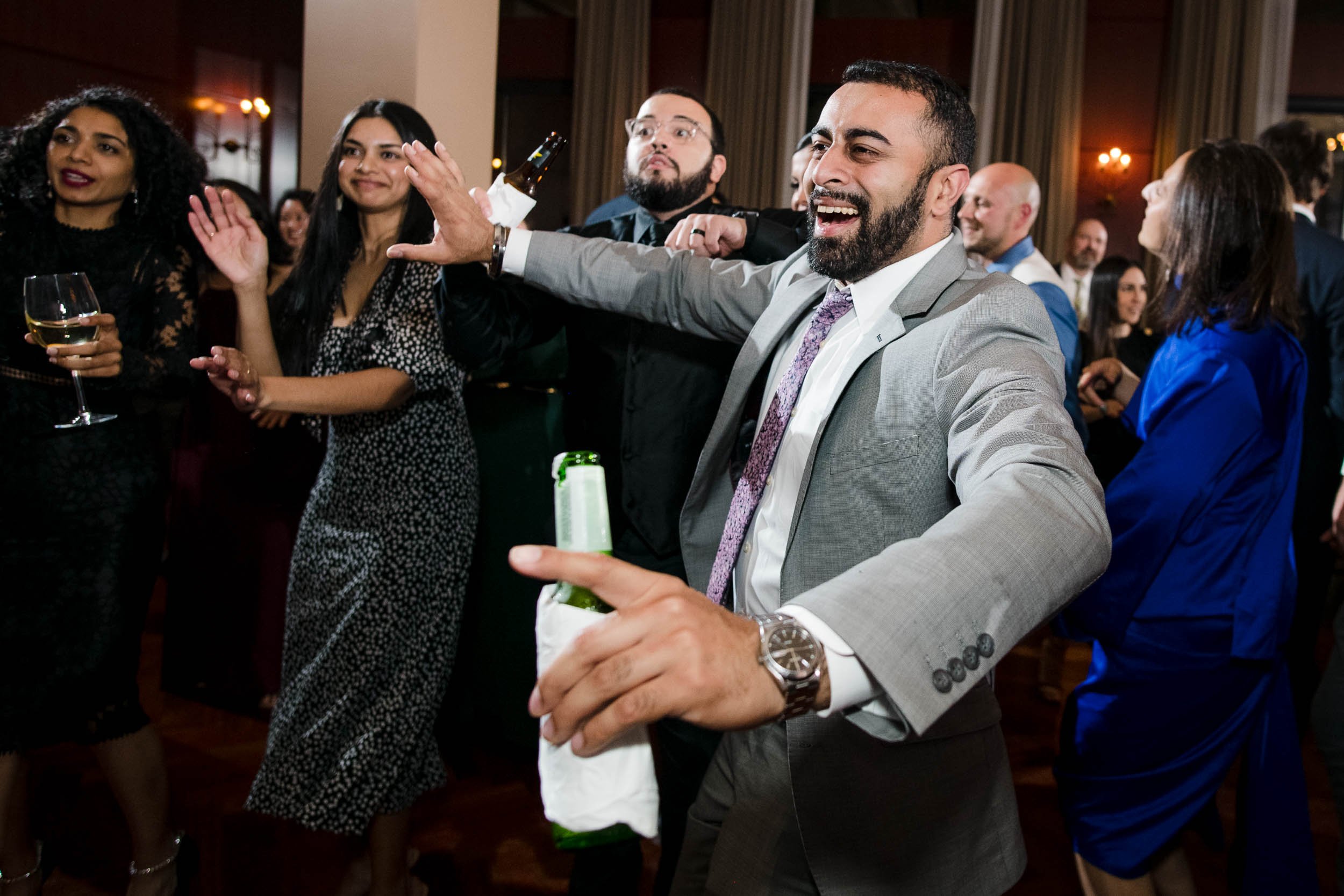 Best Wedding Photographers Near Me | Newberry Library | J. Brown Photography | funny dance floor moments with guests. 