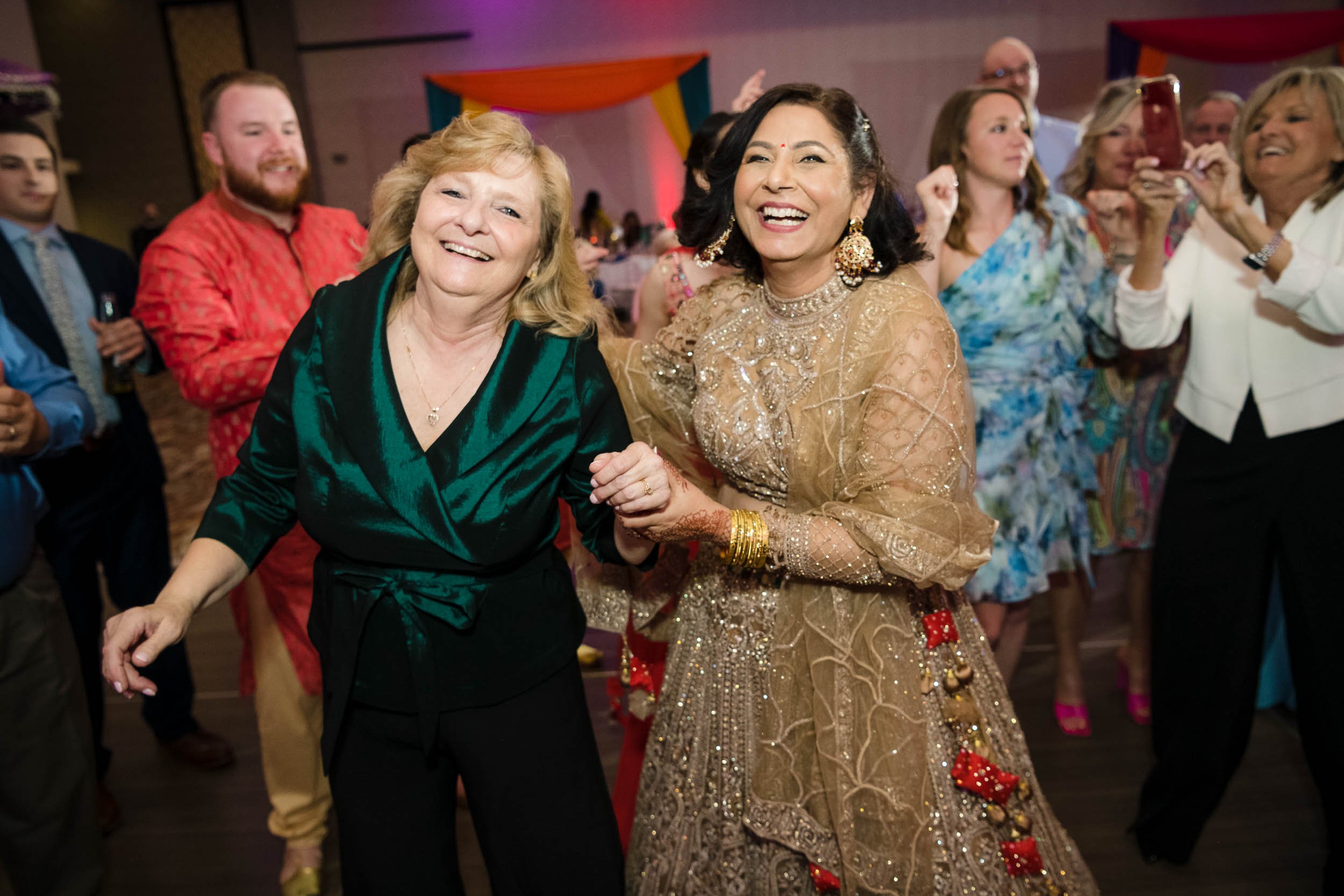 Indian Wedding Photographers Chicago | Renaissance Schaumburg | J. Brown Photography | moms of the couple on the dance floor.