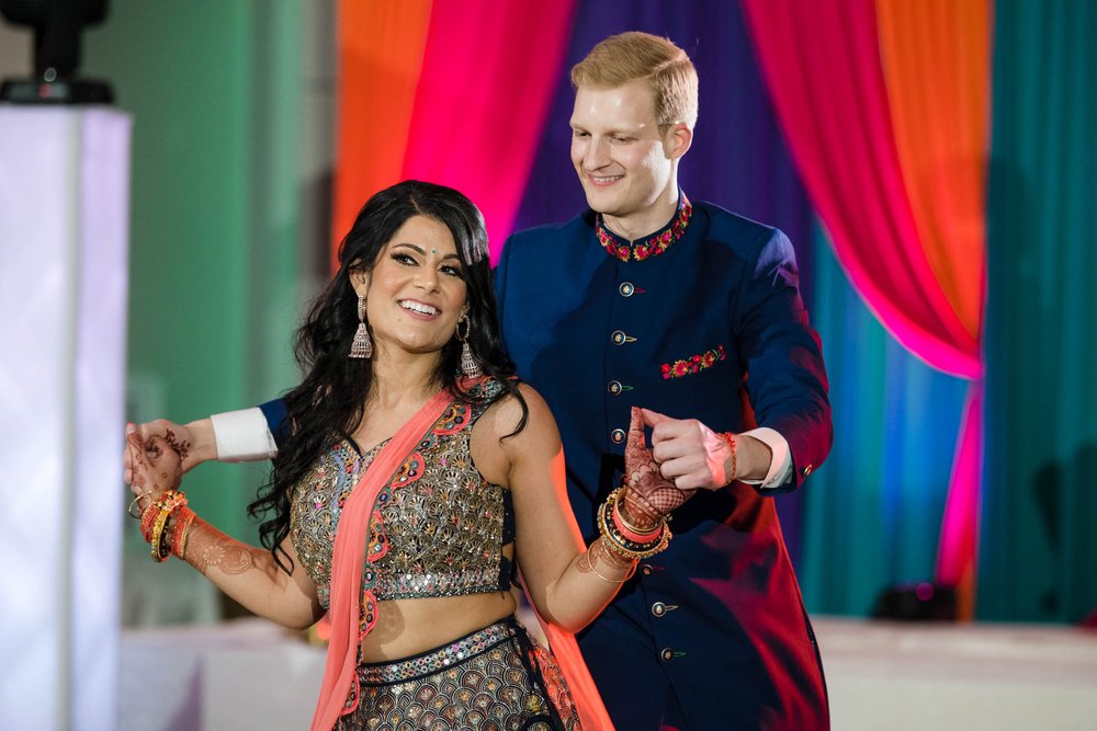 Indian Wedding Photographers Chicago | Renaissance Schaumburg | J. Brown Photography | bride and groom dance during sangeet.